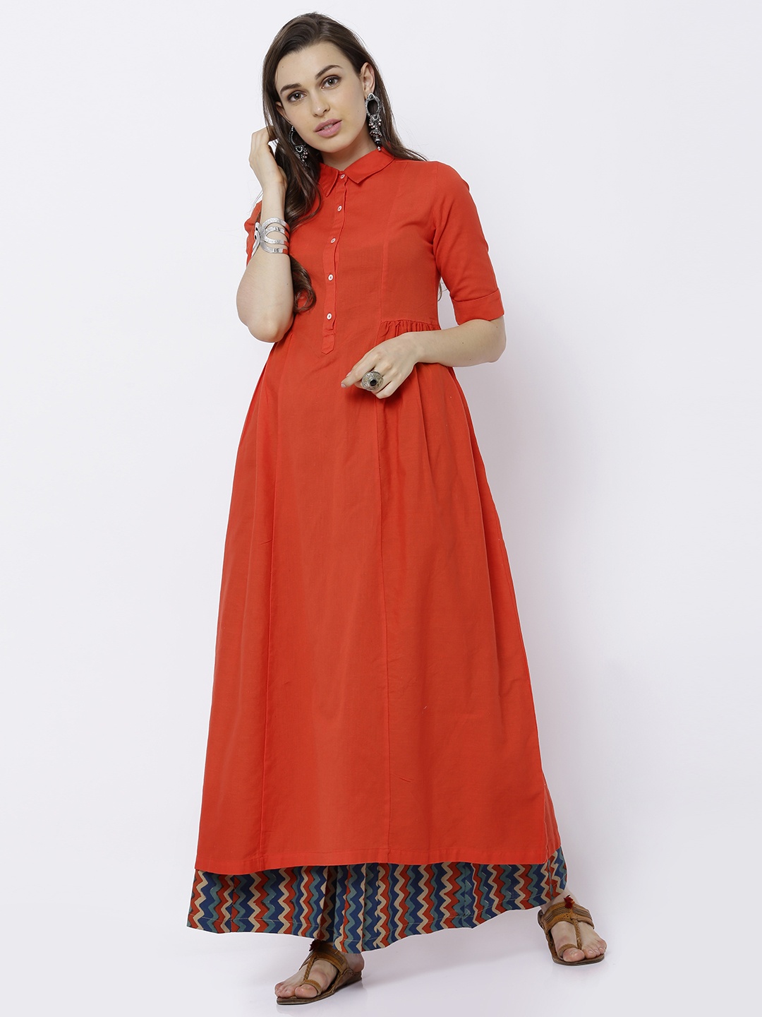 

Vishudh Women Orange Solid A-Line Kurta