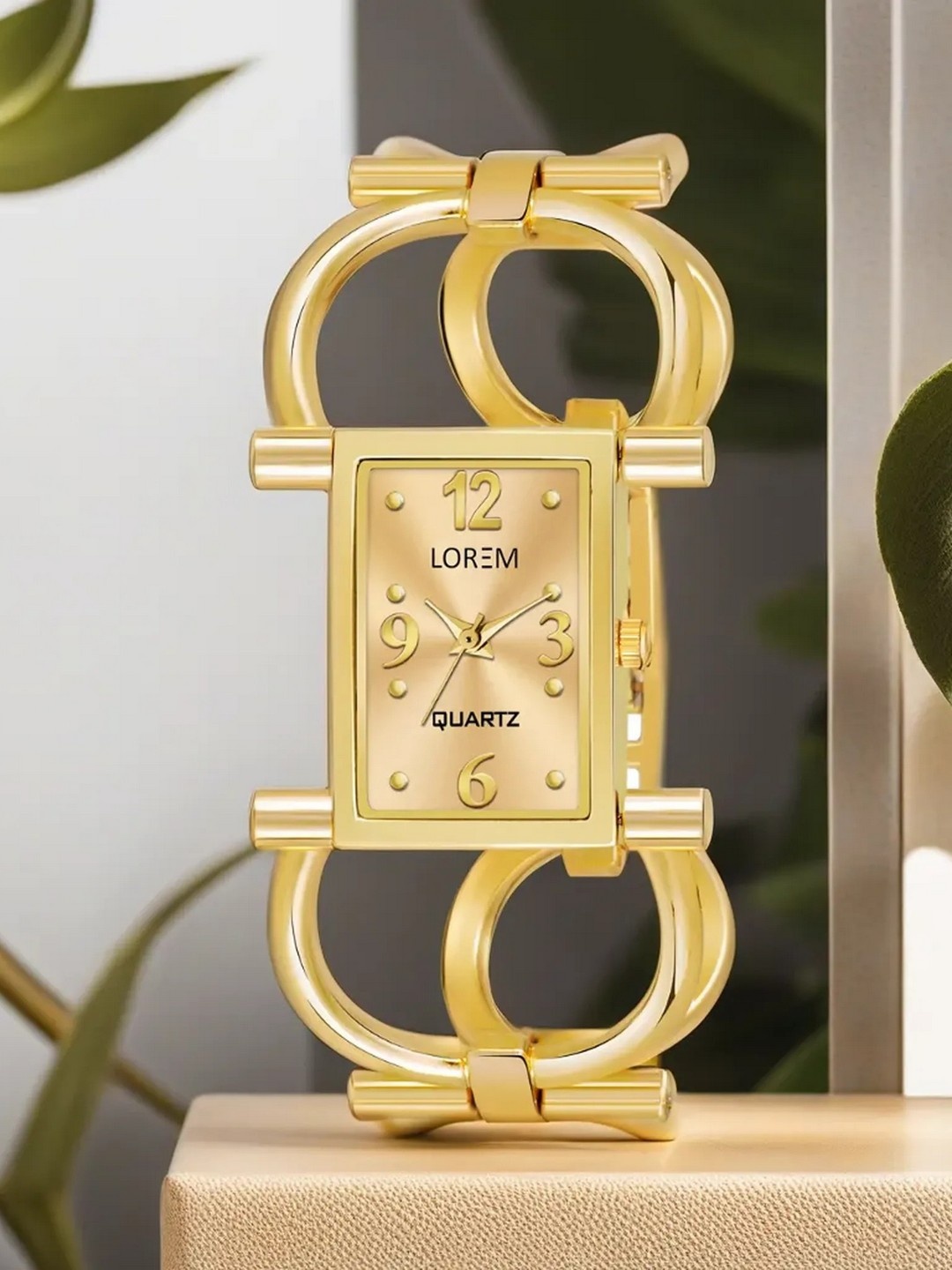 

LOREM Women Gold-Toned Brass Embellished Dial & Gold Toned Bracelet Style Straps Analogue Watch LR294