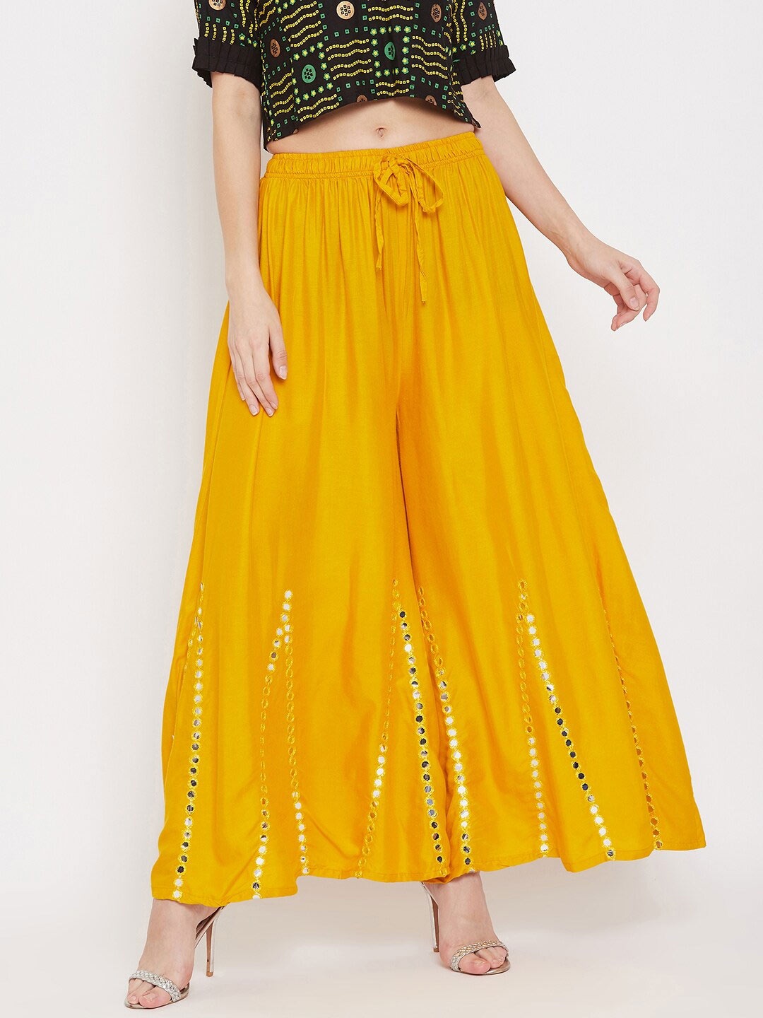 

Clora Creation Women Mustard Yellow Embellished Flared Ethnic Palazzo