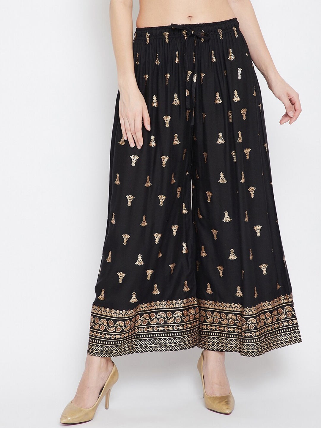 

Clora Creation Women Black & Gold-Toned Ethnic Motifs Printed Flared Knitted Ethnic Palazzos