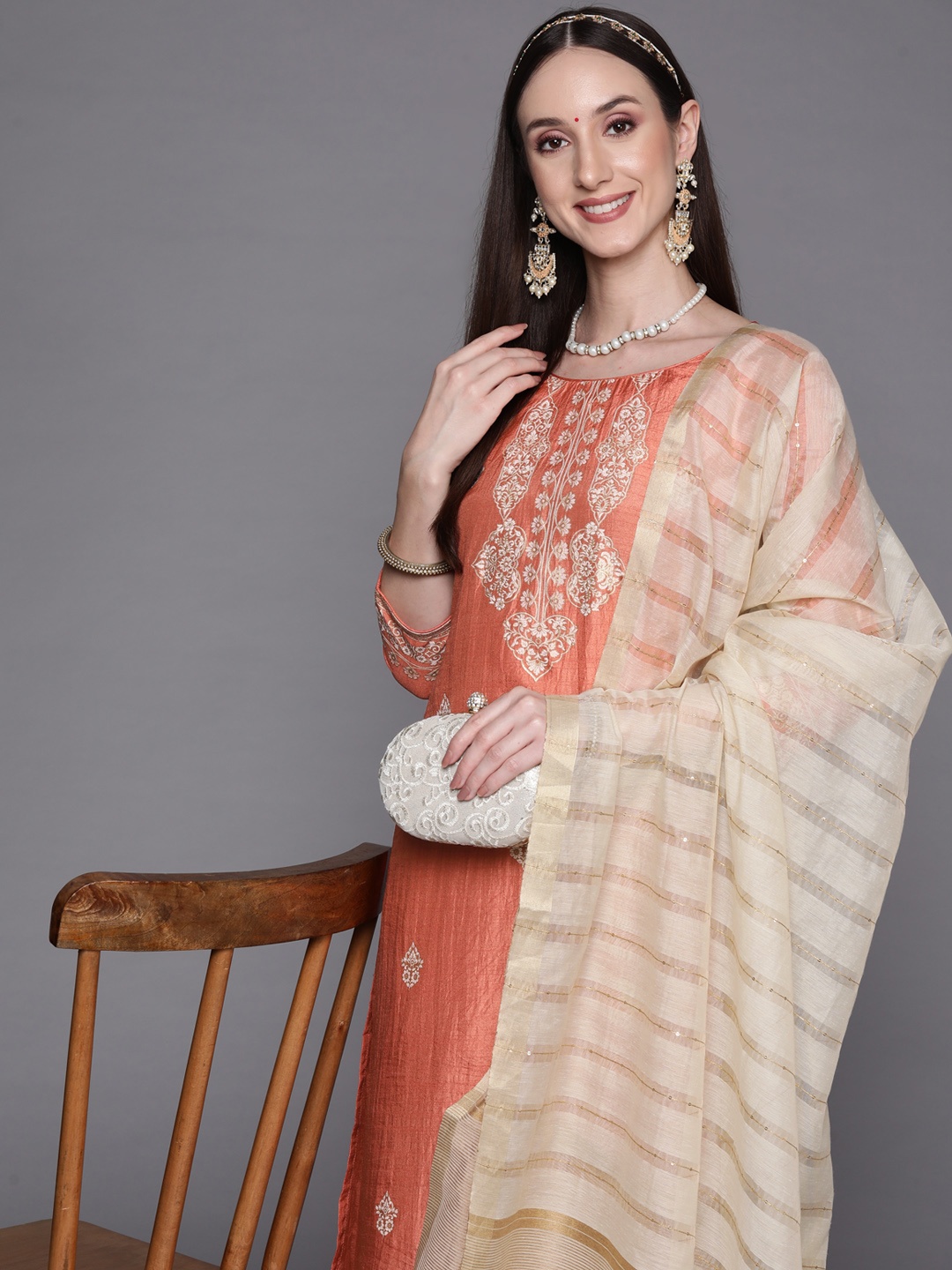 

Indo Era Women Rust Orange Ethnic Motifs Printed Kurta with Palazzos & With Dupatta