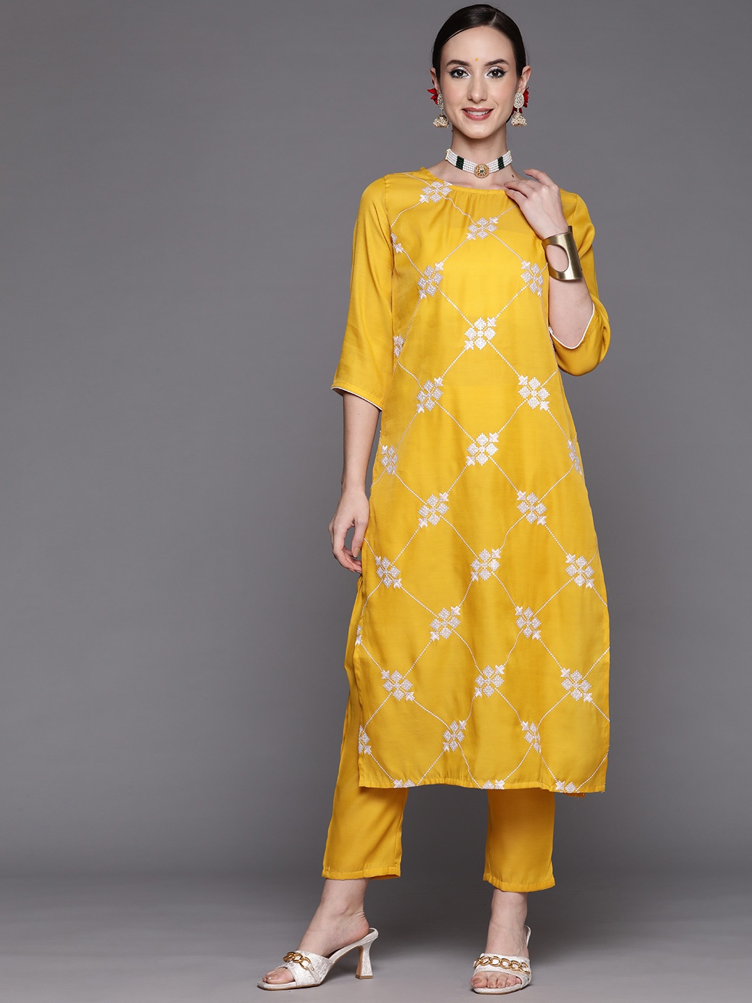 

Indo Era Women Mustard Yellow & White Embroidered Sequinned Kurta with Trousers