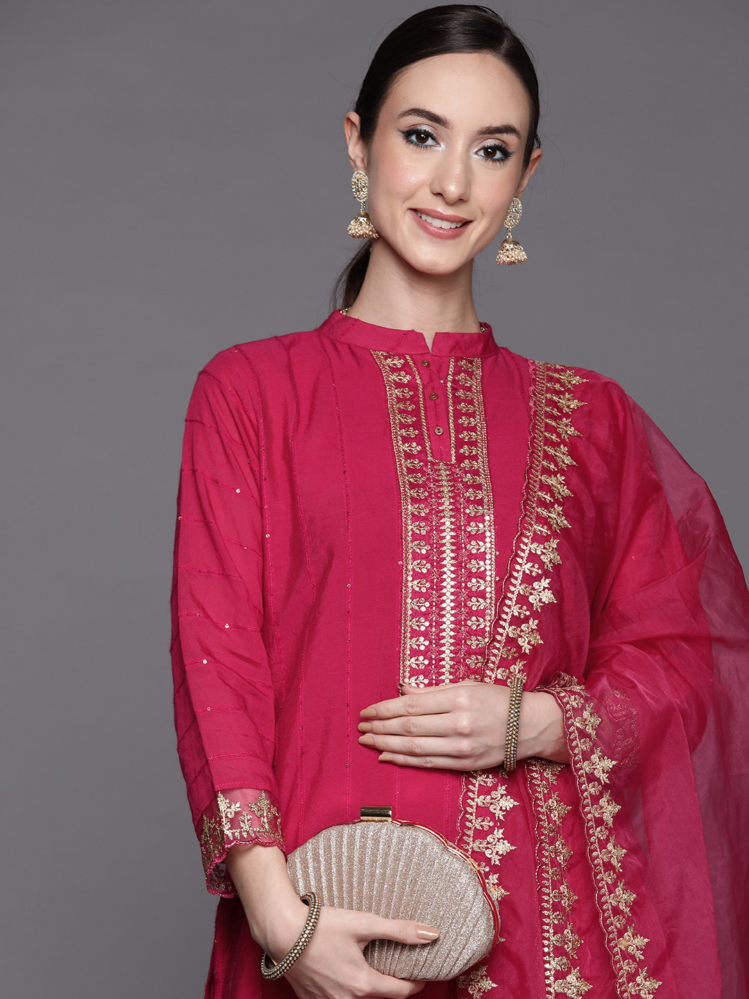

Indo Era Women Pink & Golden Yoke Design Kurta with Trousers & With Dupatta