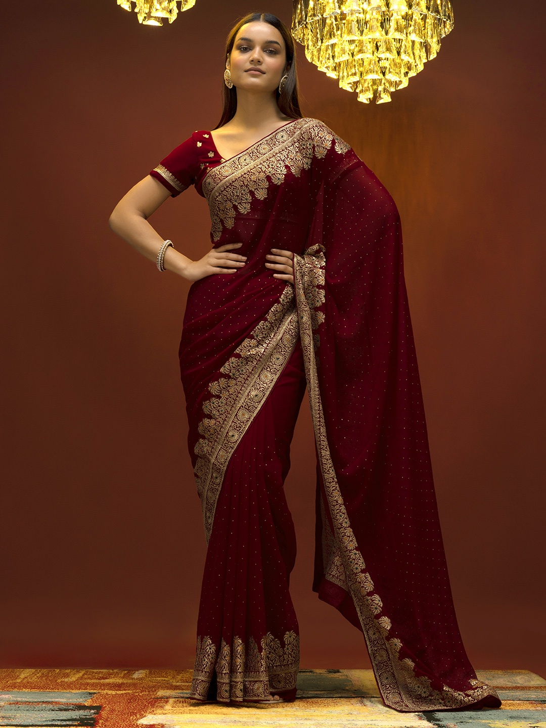 

Soch Maroon & Gold-Toned Beads and Stones Pure Georgette Saree
