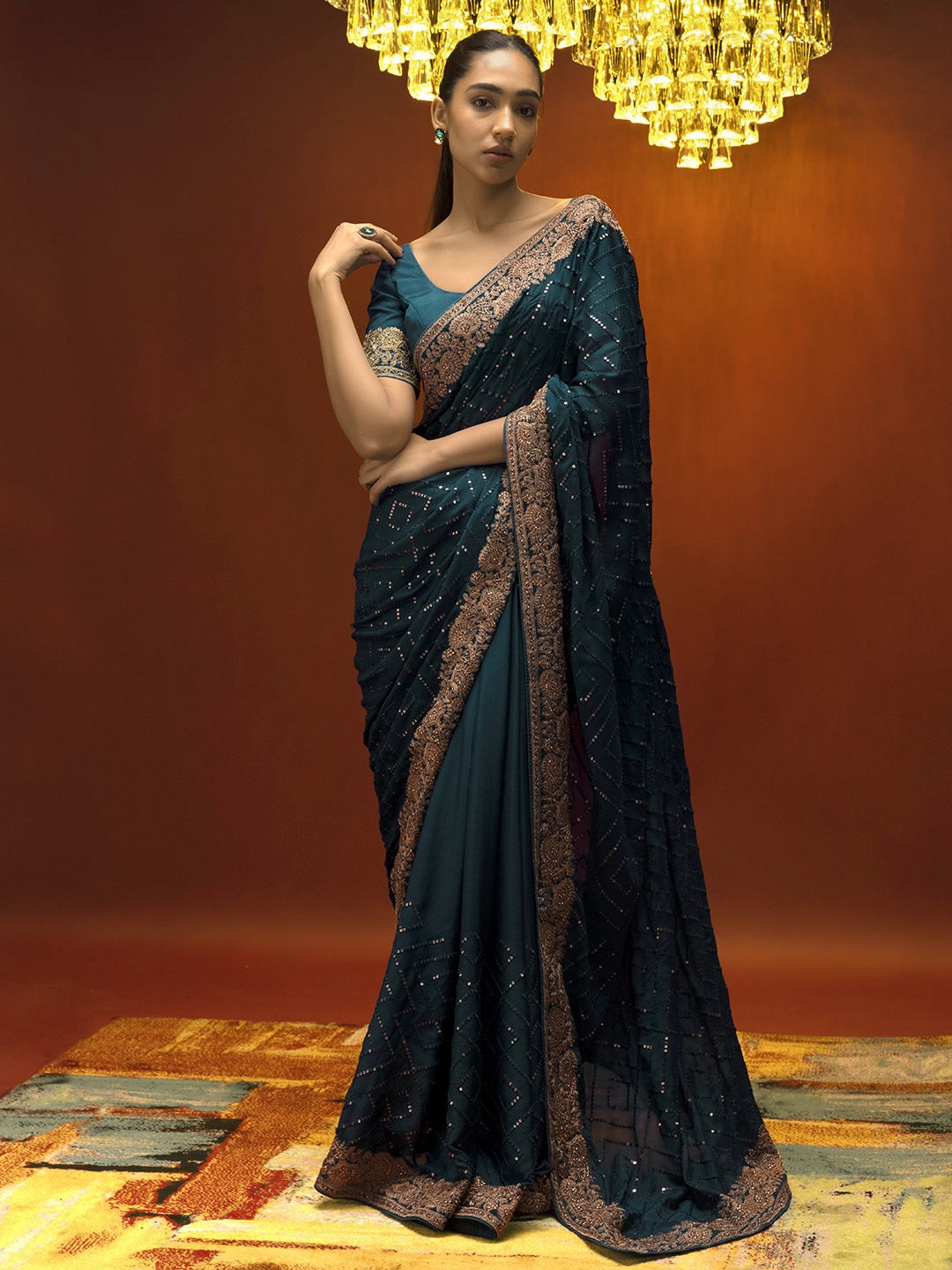 

Soch Turquoise Blue & Gold-Toned Beads and Stones Saree