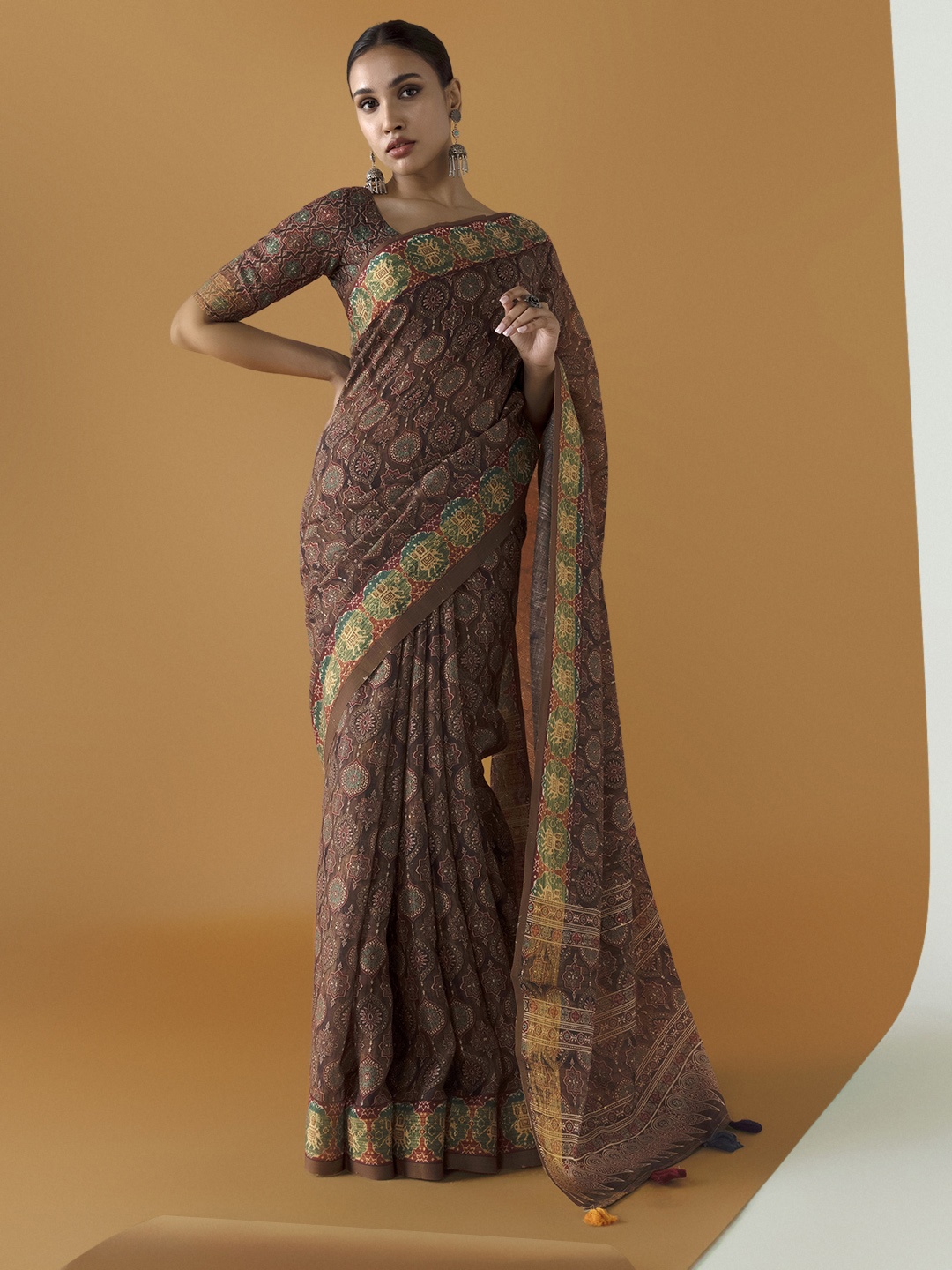 

Soch Brown & Green Printed Ethnic Motifs Saree