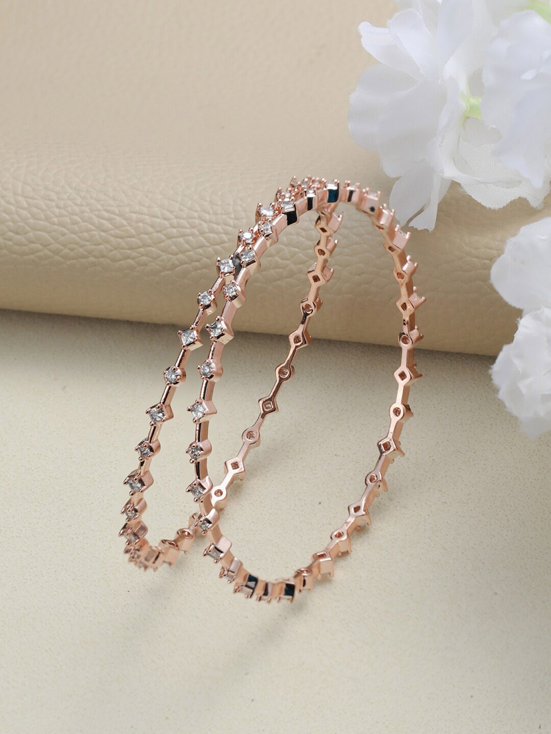 

Jazz and Sizzle Set Of 2 Rose Gold-plated White AD Studded Bangles