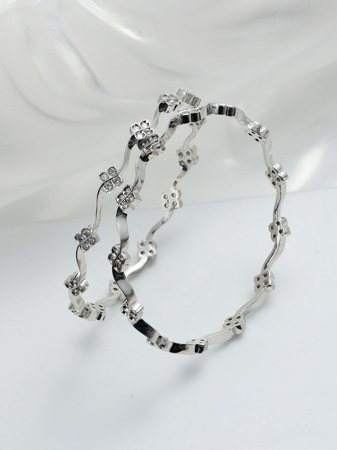 

Jazz and Sizzle Set Of 2 Women Silver-Plated & Toned AD Studded Bangles