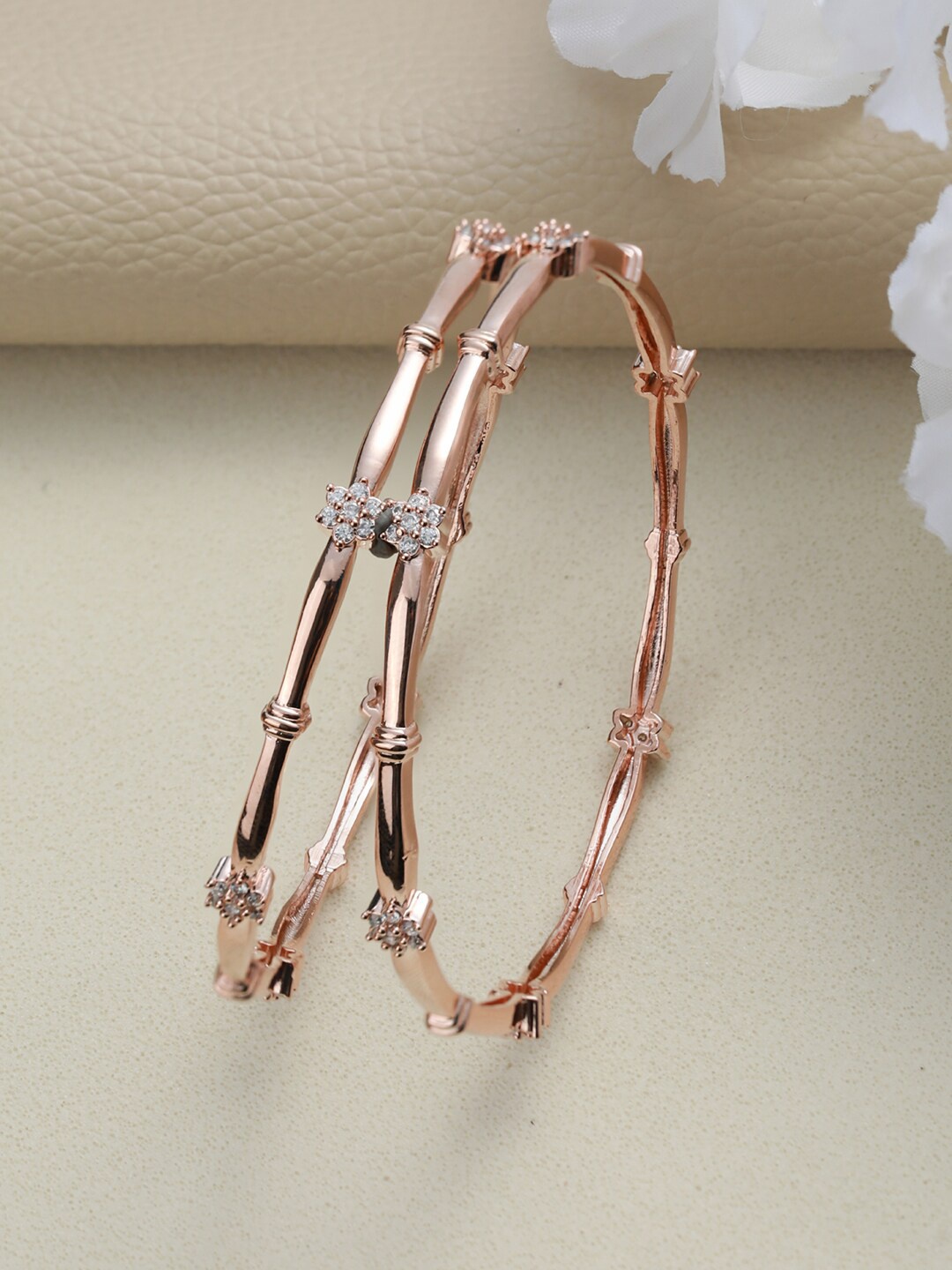 

Jazz and Sizzle Set of 2 Rose Gold Plated AD Studded Textured Bangles