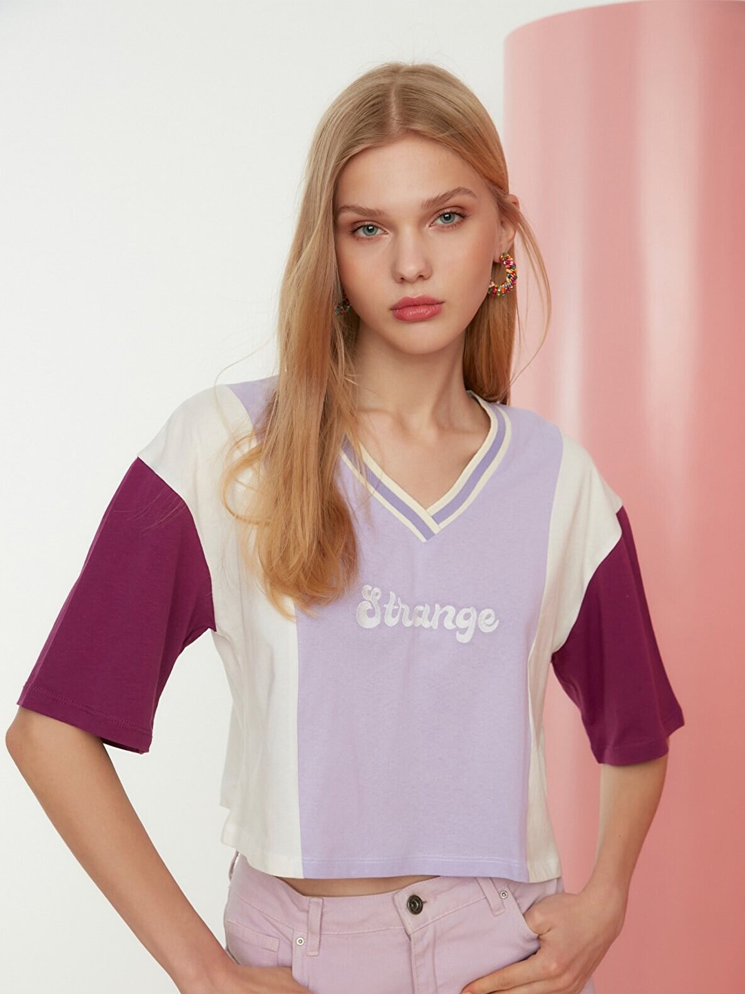 

Trendyol Women Violet Typography Colourblocked V-Neck Extended Sleeves T-shirt