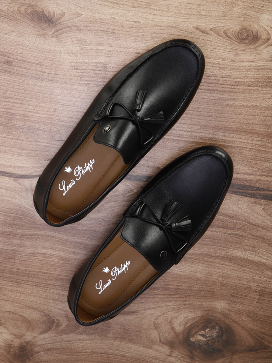 

Louis Philippe Men Black Solid Formal Loafers