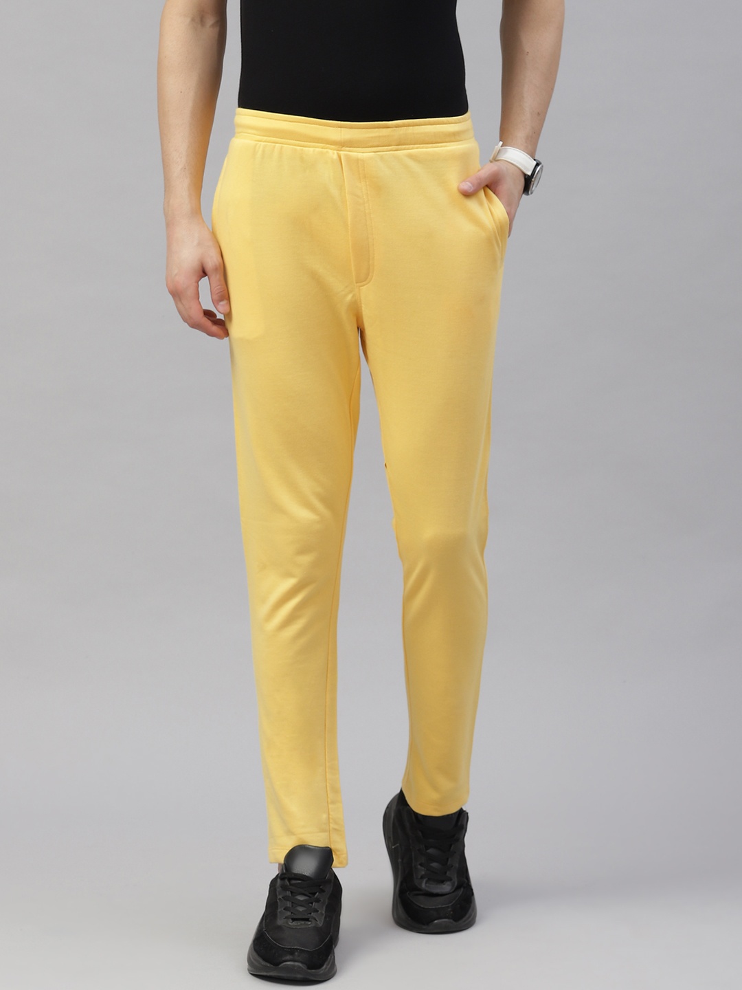 

Pierre Carlo Men Solid Slim Fit Track Pants, Yellow