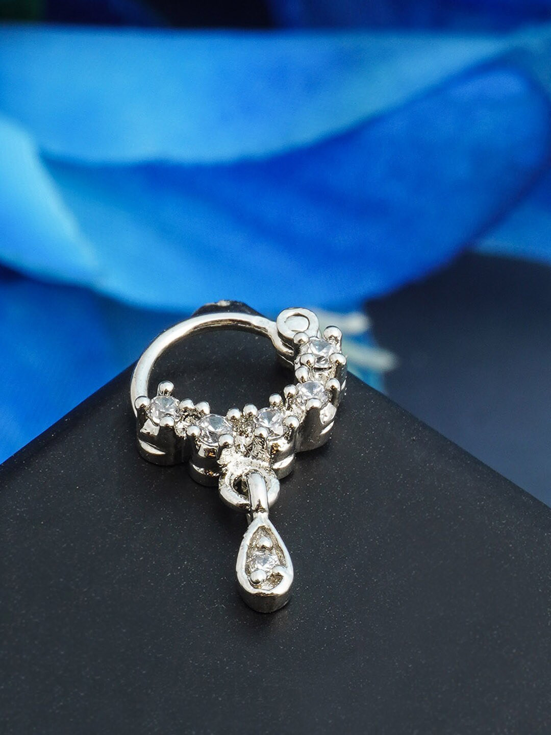 

Urmika Silver-Toned White Stone-Studded Nosepin
