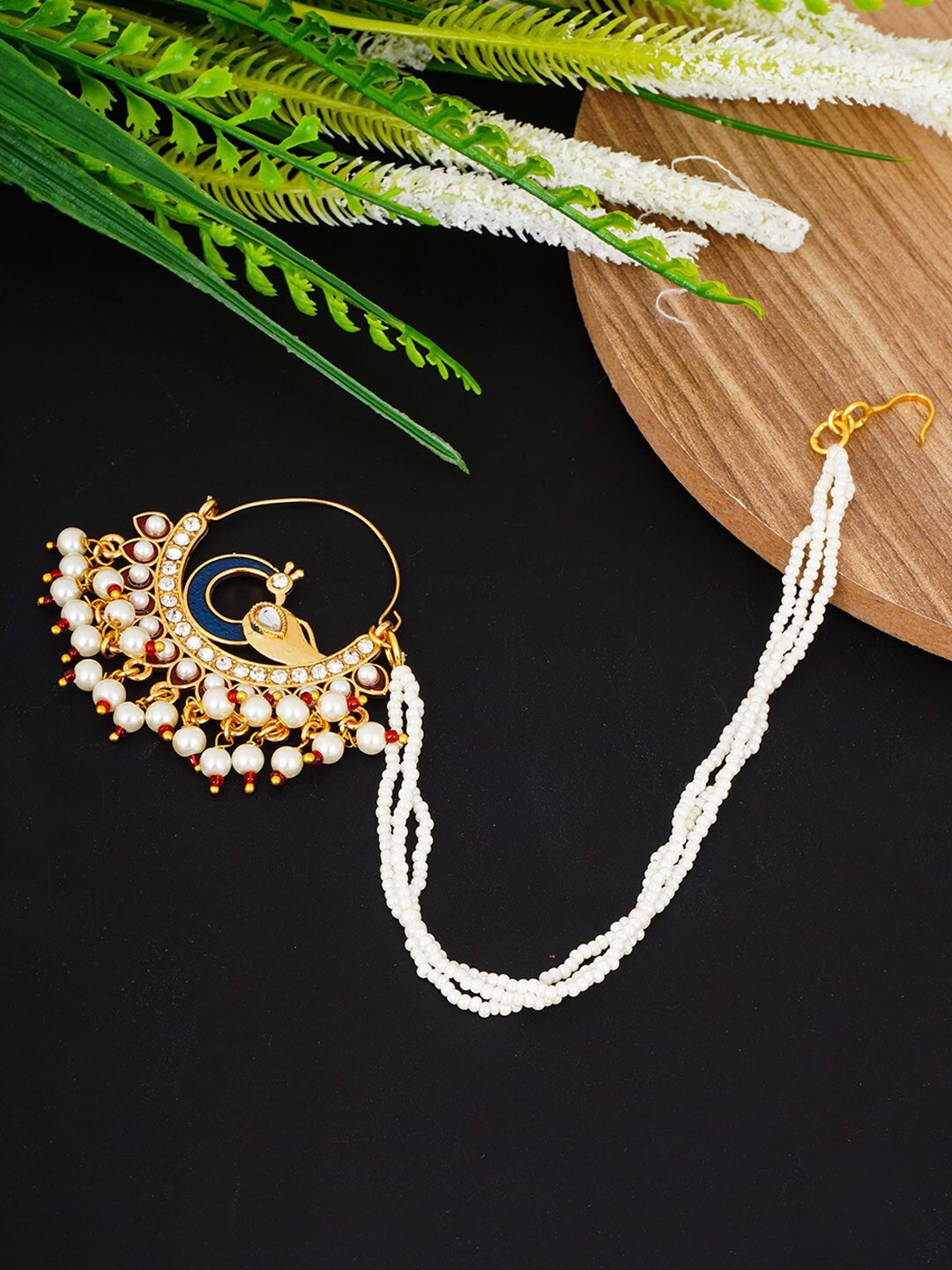 

Urmika Women Gold-Plated White & Red Stone-Studded & Pearl Beaded Peacock Nosepin