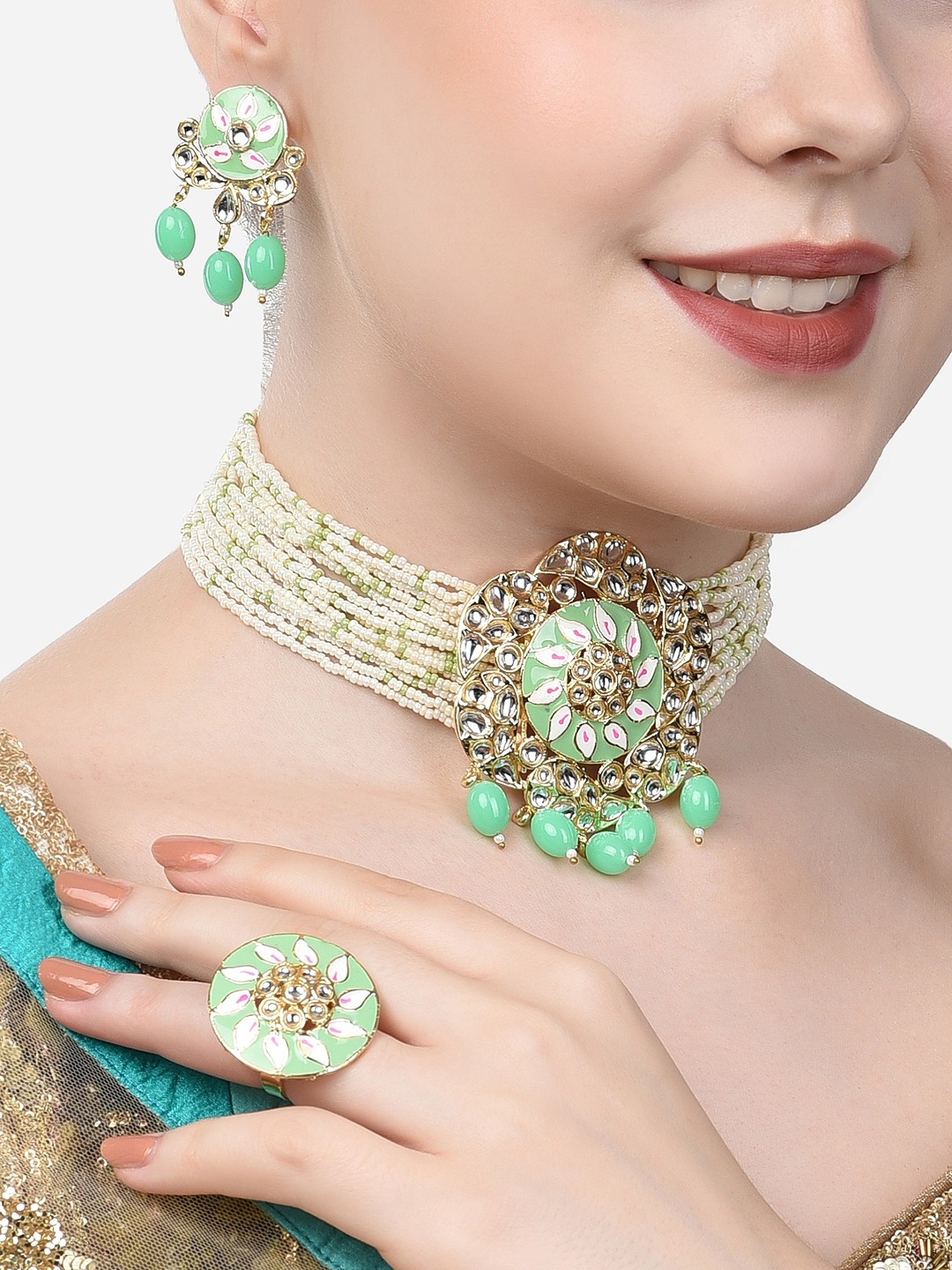 

Zaveri Pearls Gold-Plated White & Green Kundan-Studded & Pearl Beaded Jewellery Set