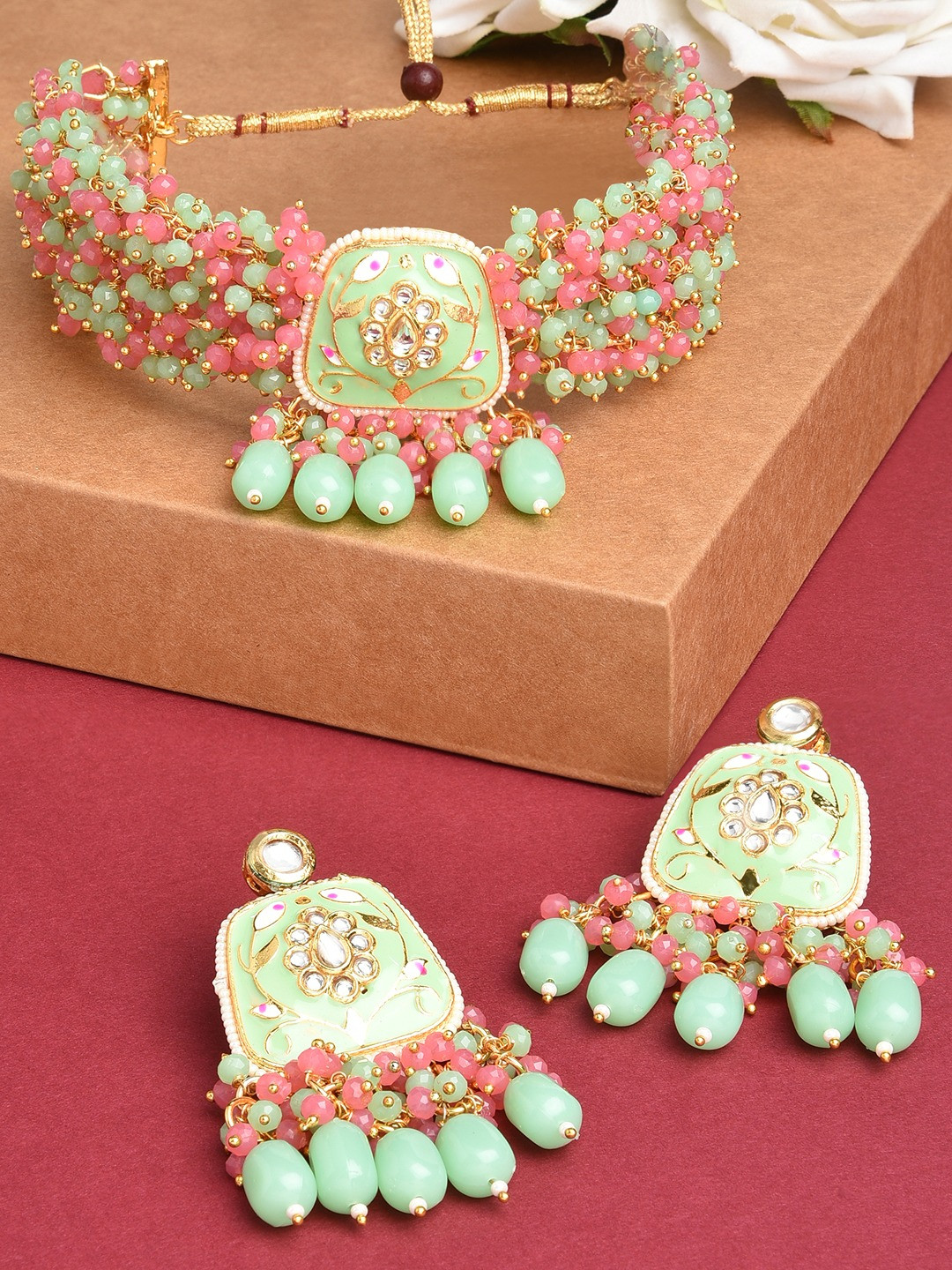 

Zaveri Pearls Gold-Plated White & Pink Kundan-Studded & Pearl Beaded Meenakari Jewellery Set