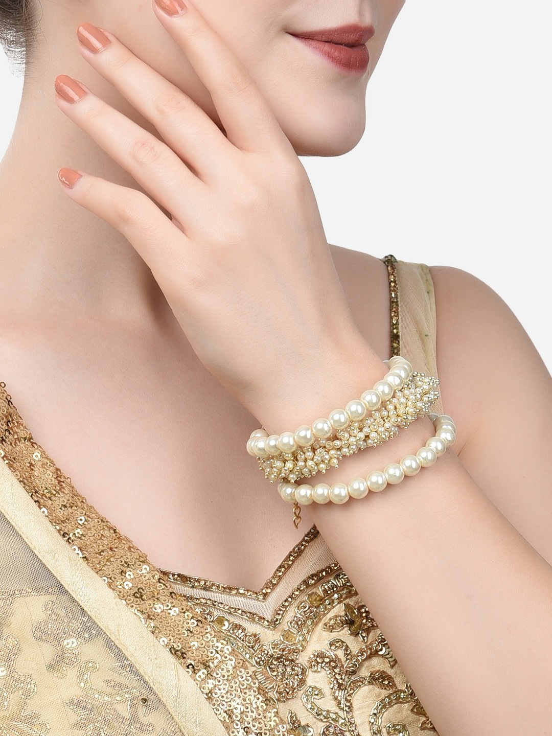 

Zaveri Pearls Women Gold-Toned & White Pearls Antique Gold-Plated Wraparound Bracelet