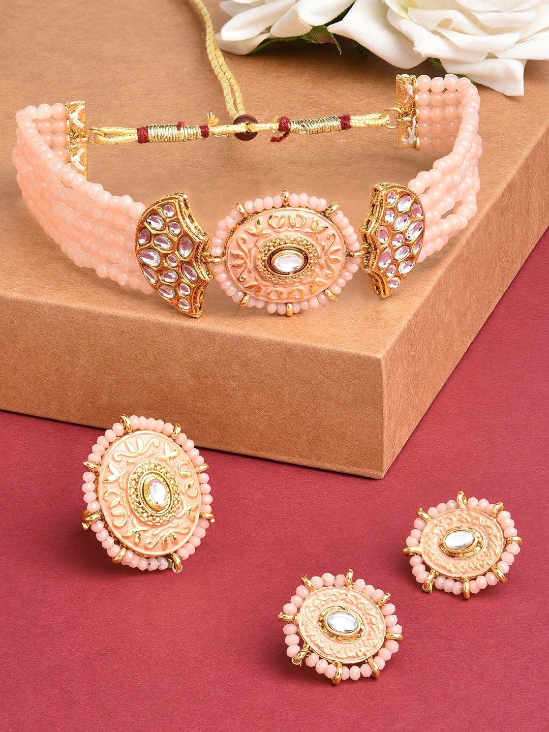 

Zaveri Pearls White & Peach-coloured Kundan-Studded & Pearl Beaded Meenakari Jewellery Set, Gold