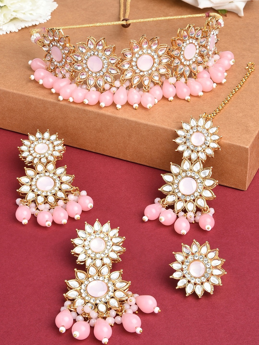 

Zaveri Pearls Gold-Plated White & Pink Kundan Studded & Beaded Jewellery Set