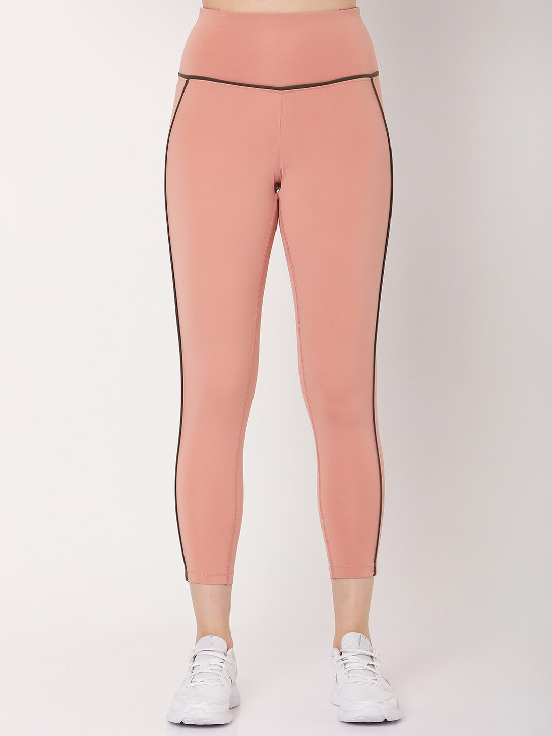 

Silvertraq Women Peach Solid Ankle-Length Leggings