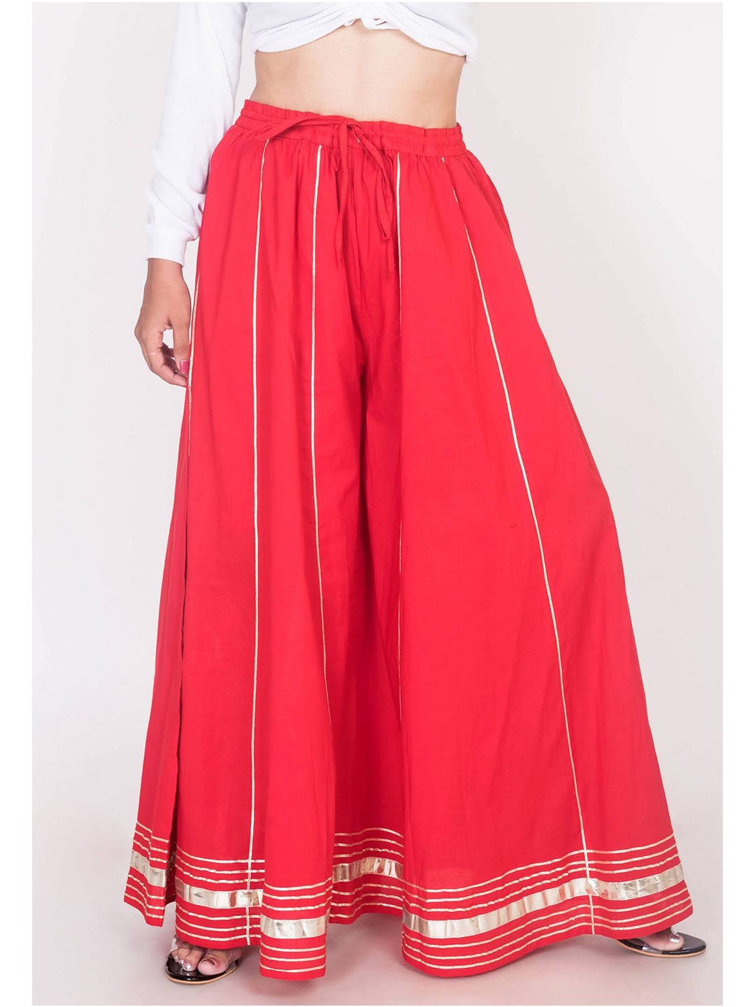 

Swasti Women Red & Gold-Toned Flared Lace Crepe Ethnic Palazzos