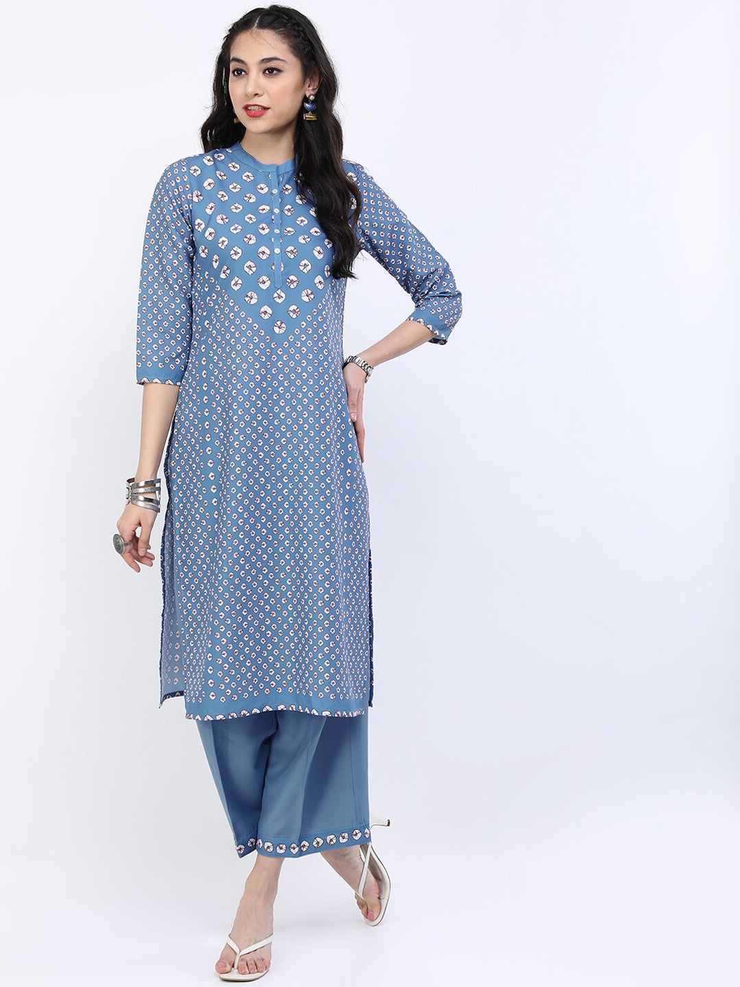

Vishudh Women Blue Floral Printed Kurta with Palazzos