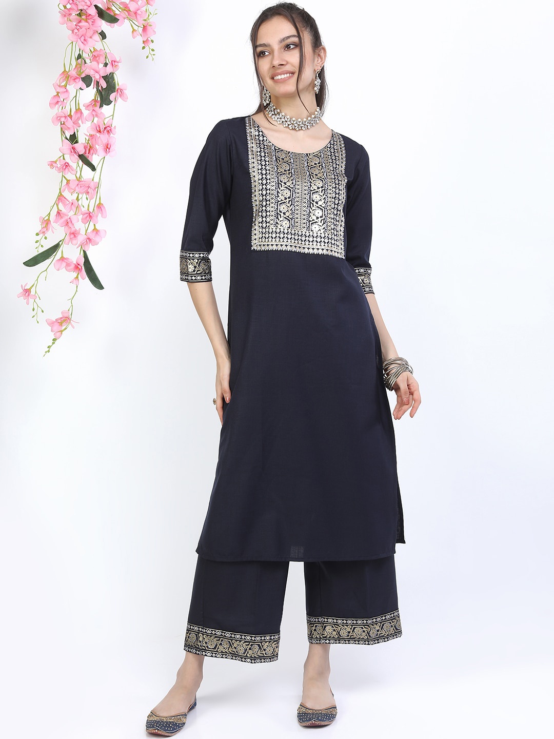 

Vishudh Women Navy Blue Floral Yoke Design Kurta with Palazzos