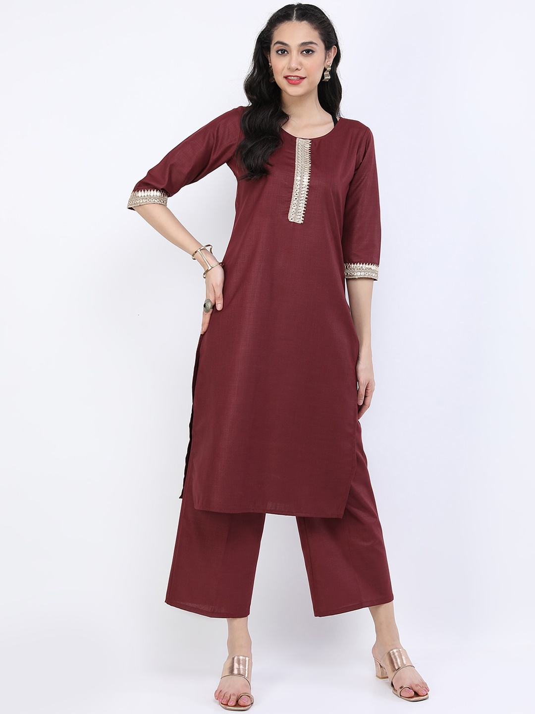 

Vishudh Women Burgundy Embroidered Thread Work Kurti with Trouser