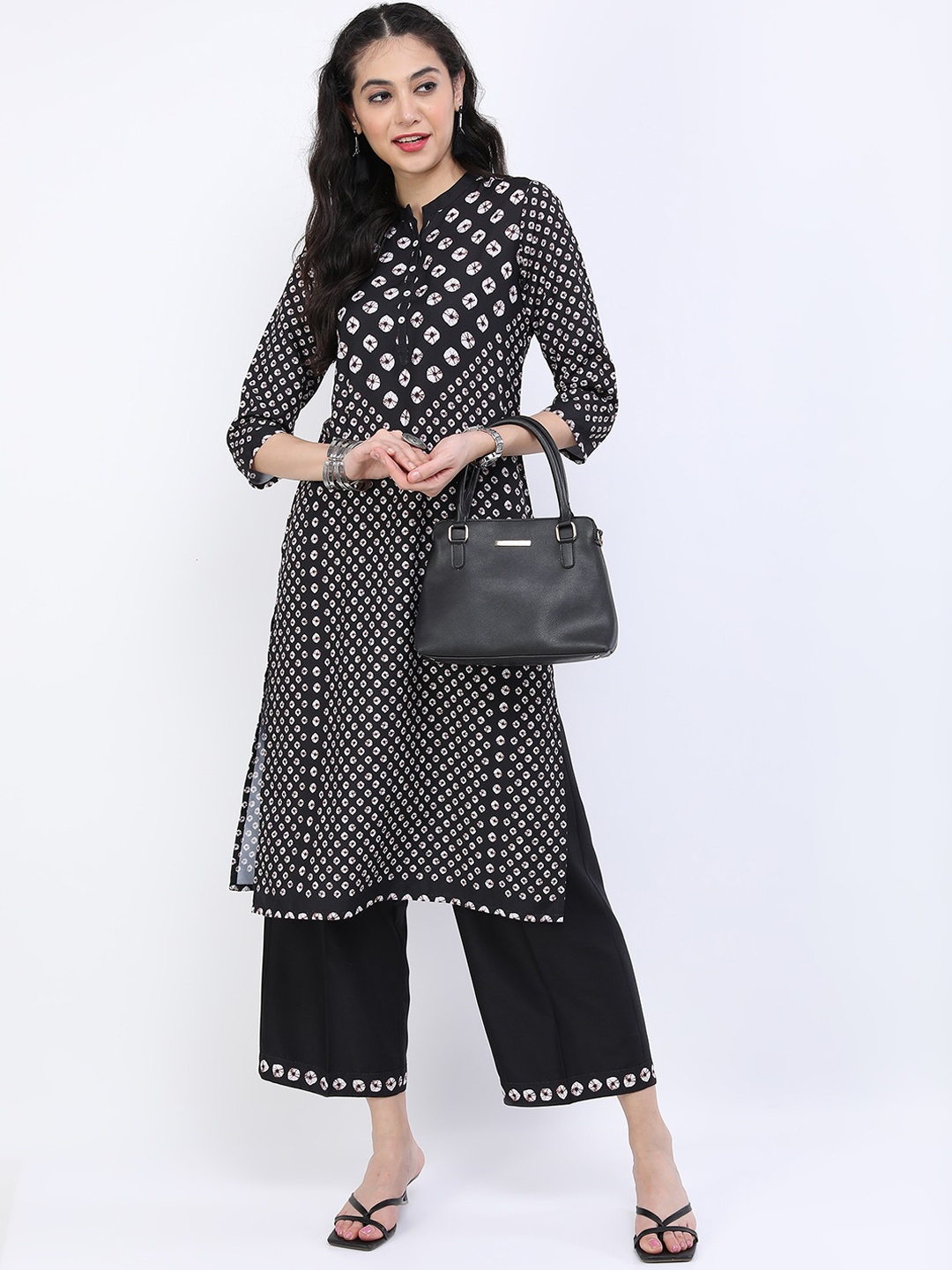 

Vishudh Women Black Printed Kurta with Trousers
