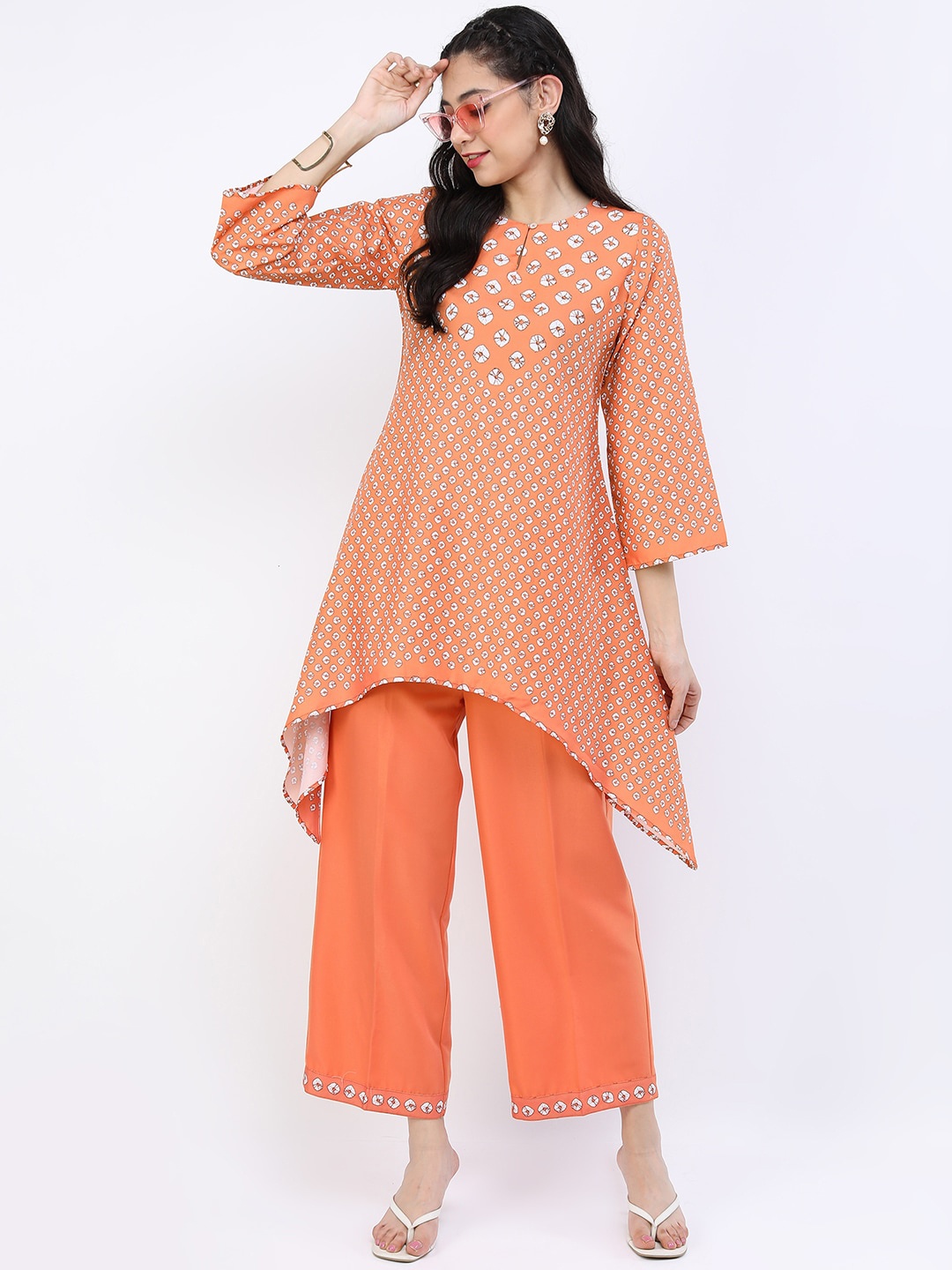 

Vishudh Women Rust Ethnic Motifs Kurti with Trousers