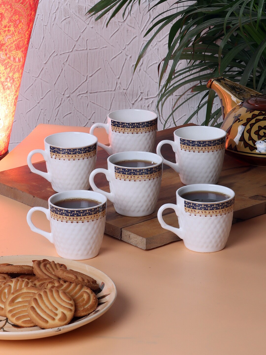 

CDI White & Brown Solid Bone China Glossy Cups Set of Cups and Mugs