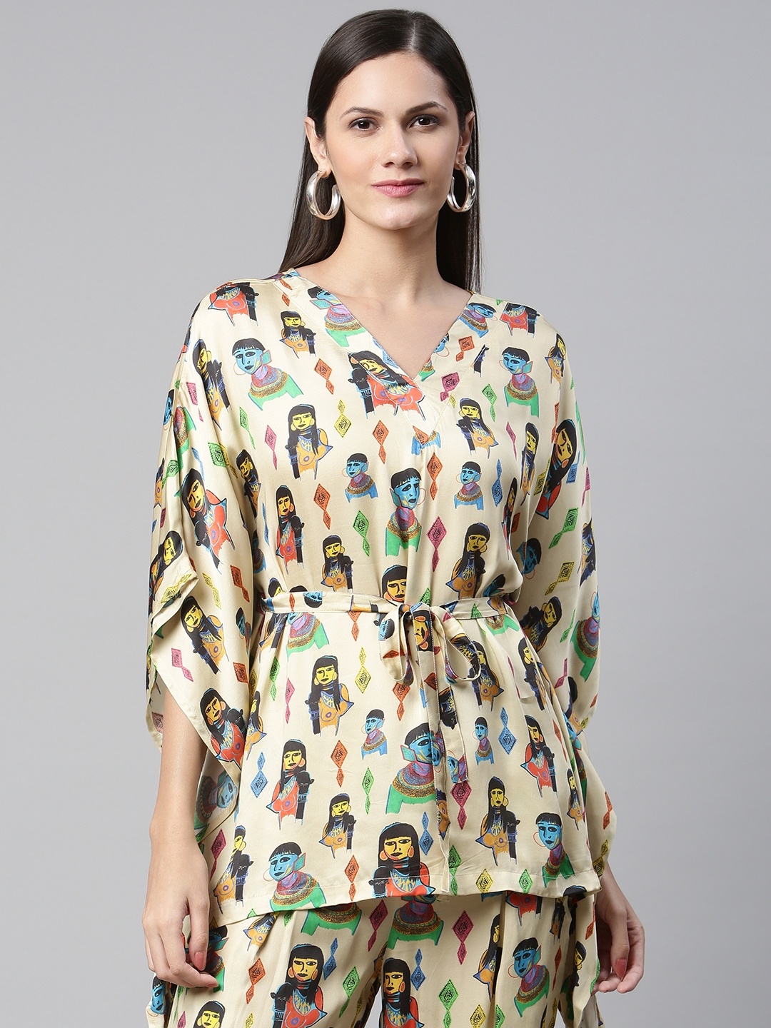 

Ayaany Beige & Blue Conversational Print Satin Finish Kaftan Top