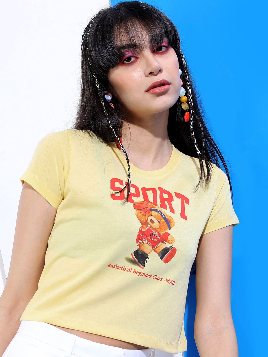 

Tokyo Talkies Women Yellow Printed Slim Fit T-shirt