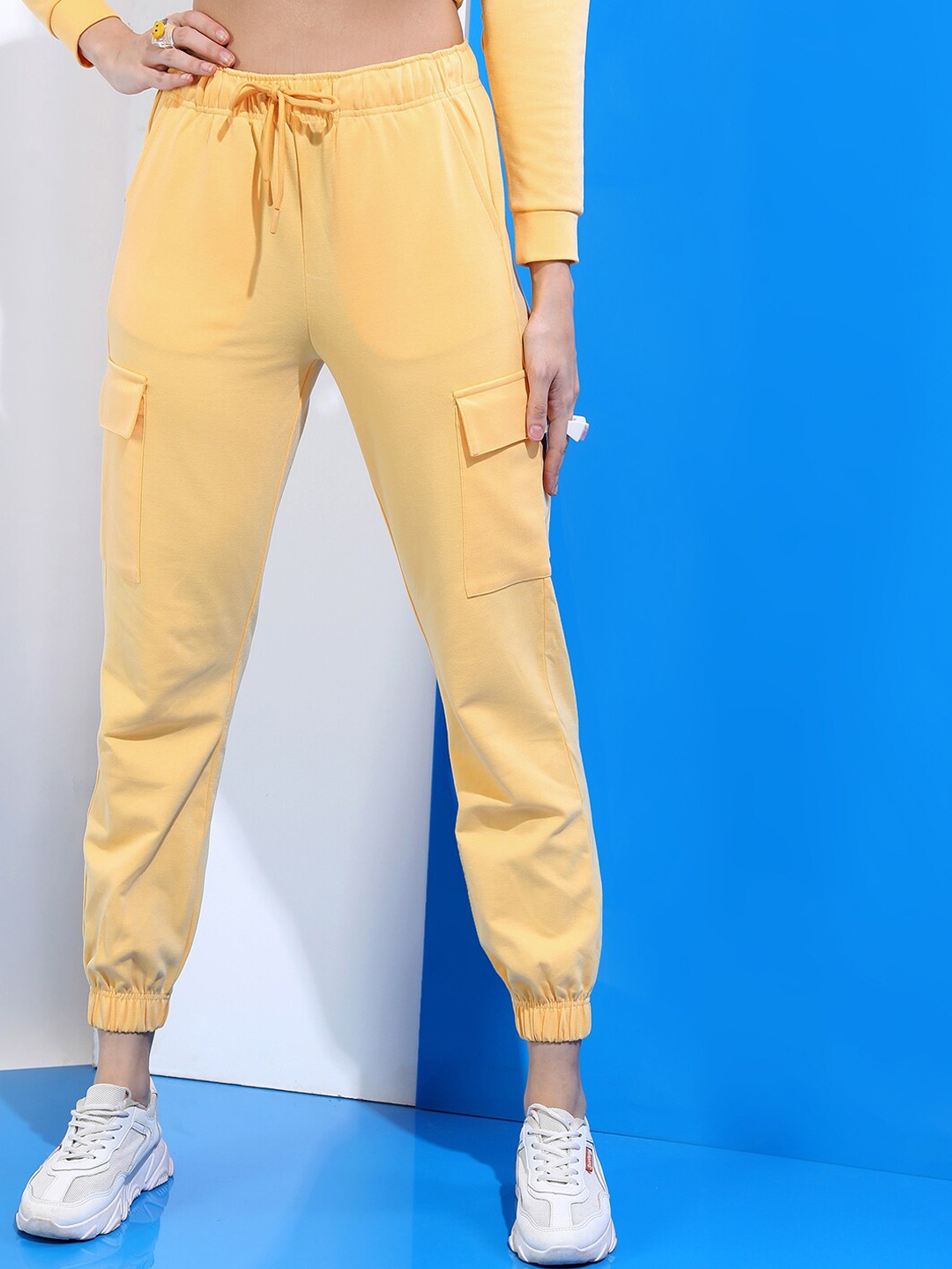 

Tokyo Talkies Women Orange Slim Fit Knited Joggers