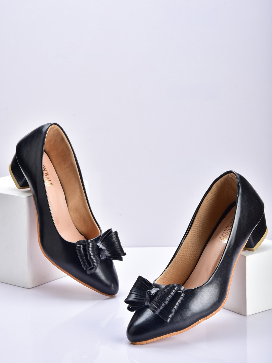 

Moonwalk Black Embellished Block Pumps with Bows