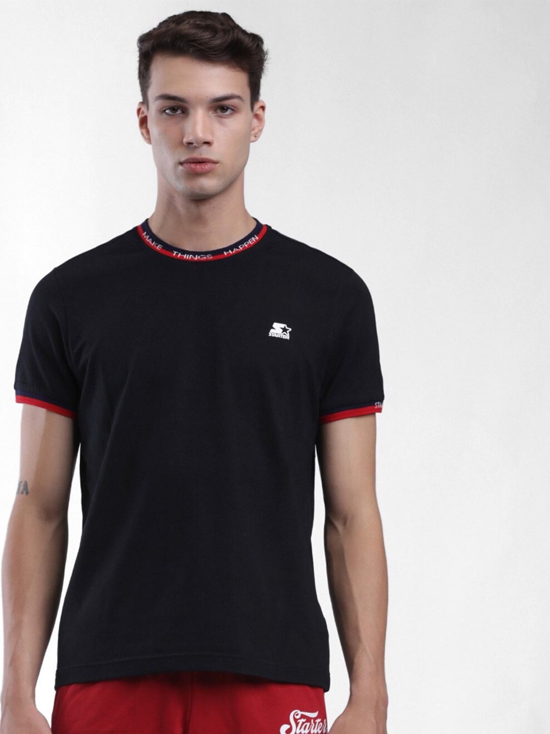 

STARTER Men Black Solid Round Neck T-shirt