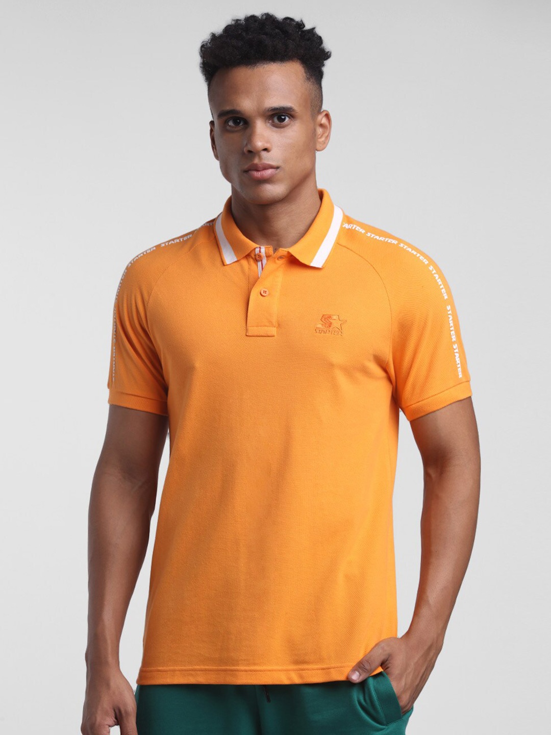 

STARTER Men Orange Solid Short Sleeves Polo Collar T-shirt