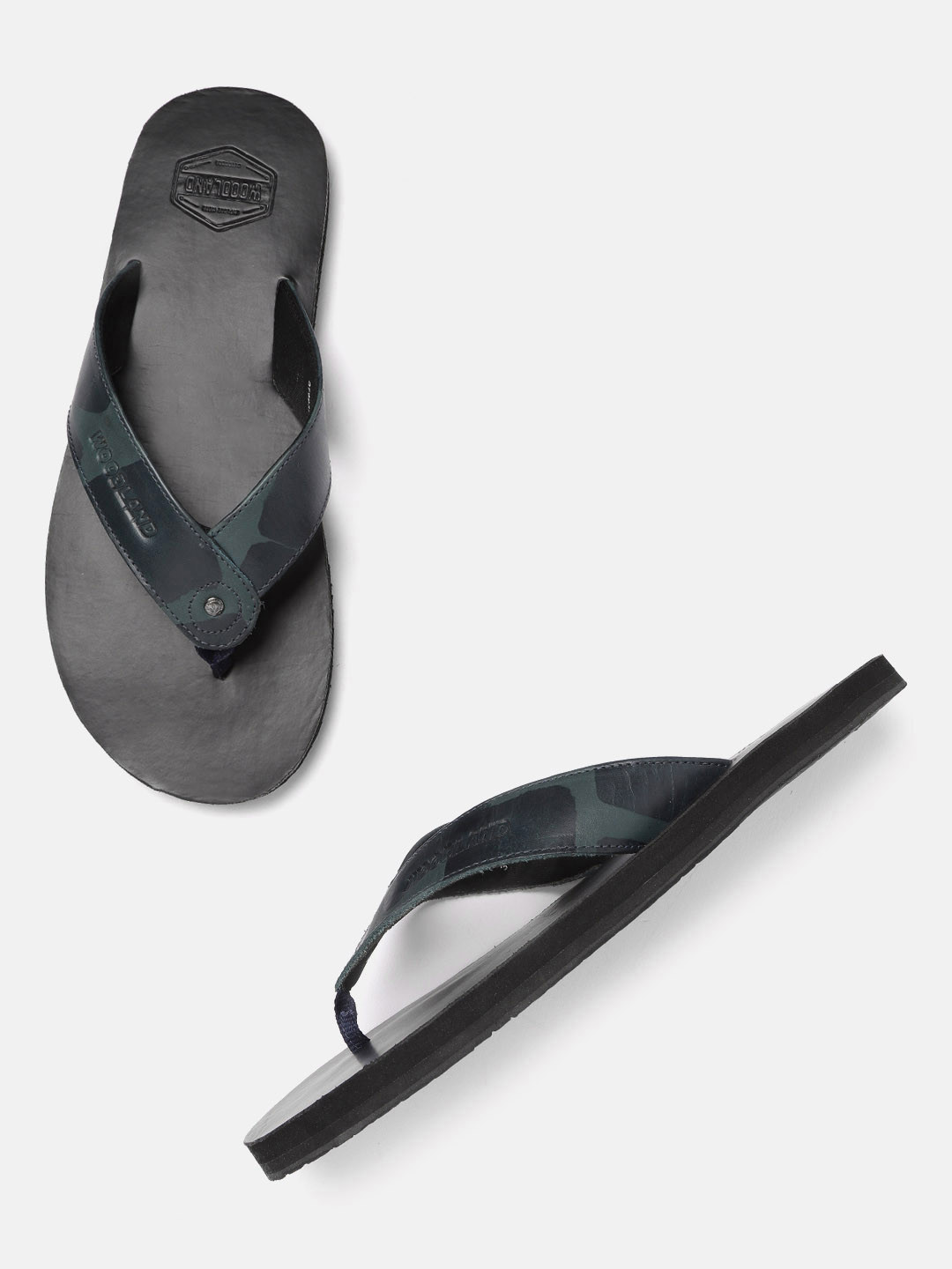 

Woodland Men Green & Black Printed Thong Flip-Flops