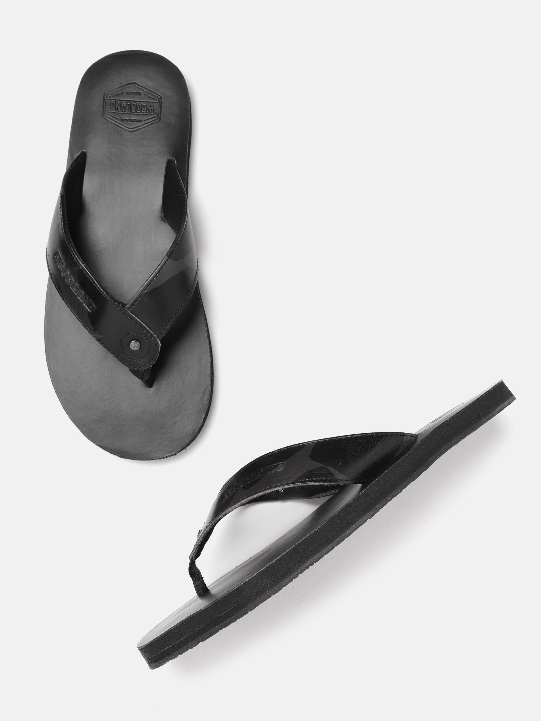 

Woodland Men Grey & Black Printed Thong Flip-Flops