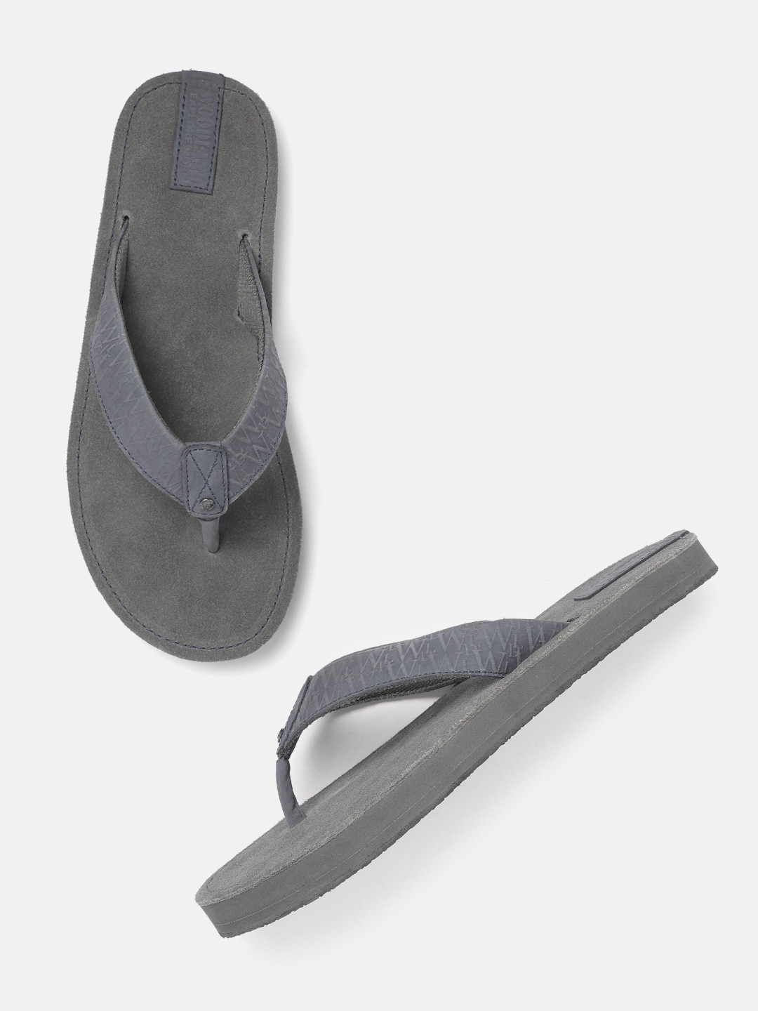 

Woodland Men Grey Solid Thong Flip-Flops