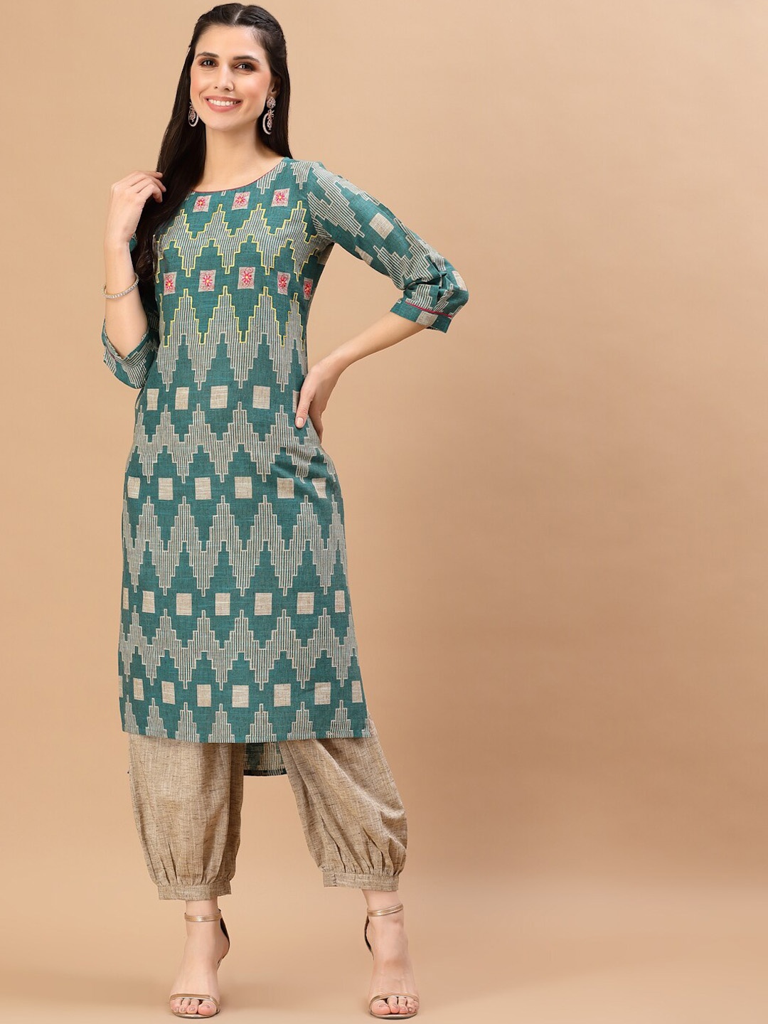 

Smiro Women Teal Ethnic Motifs Embroidered Thread Work Kurta