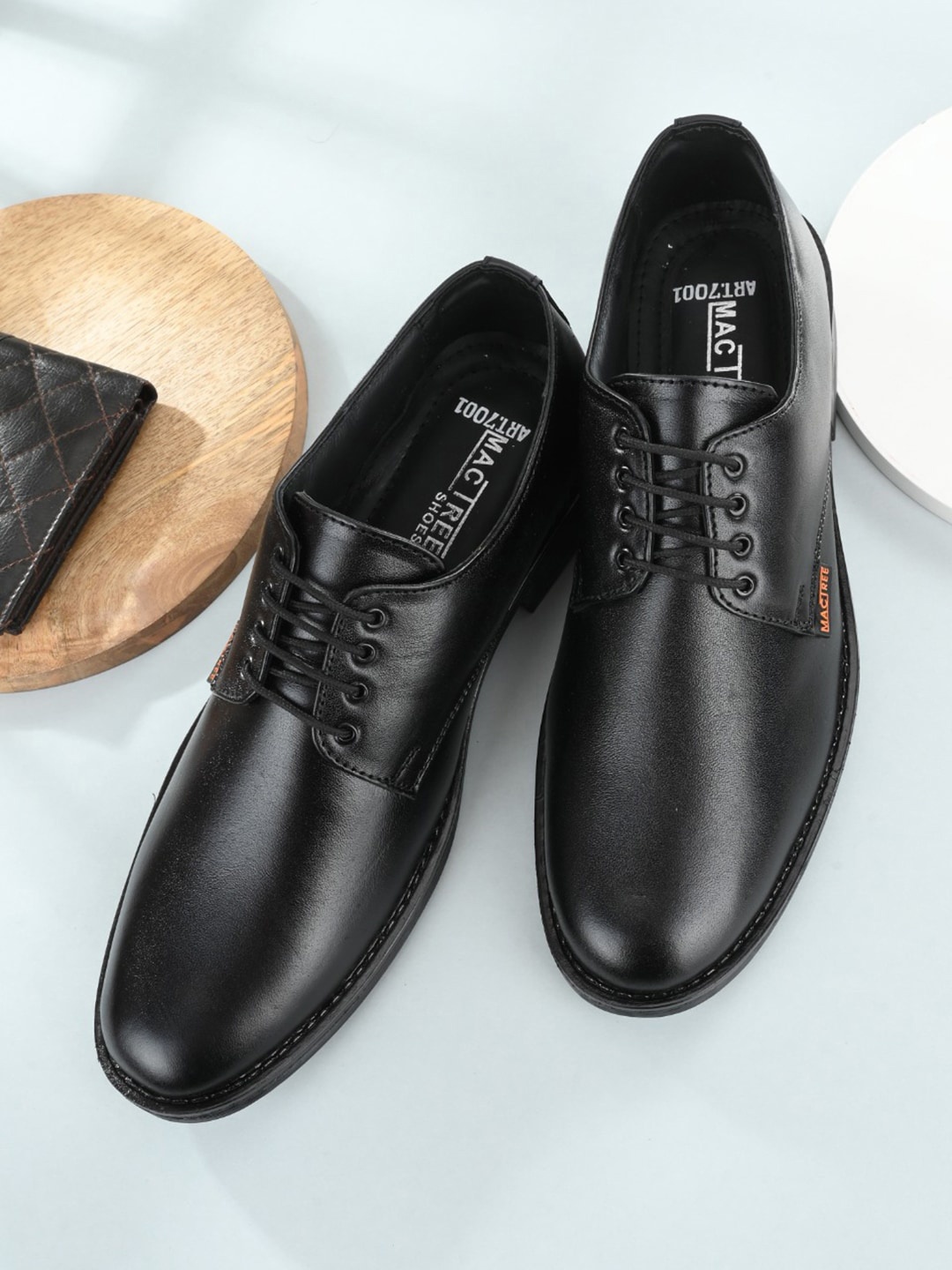 

Mactree Men Black Solid Leather Formal Derbys