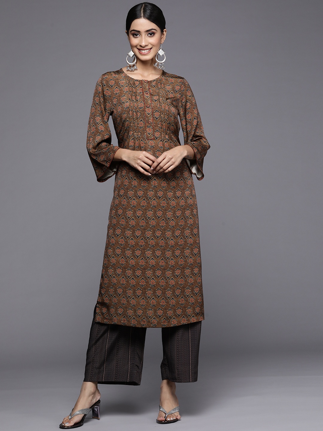 

Biba Women Brown Floral Printed Kurta with Palazzos