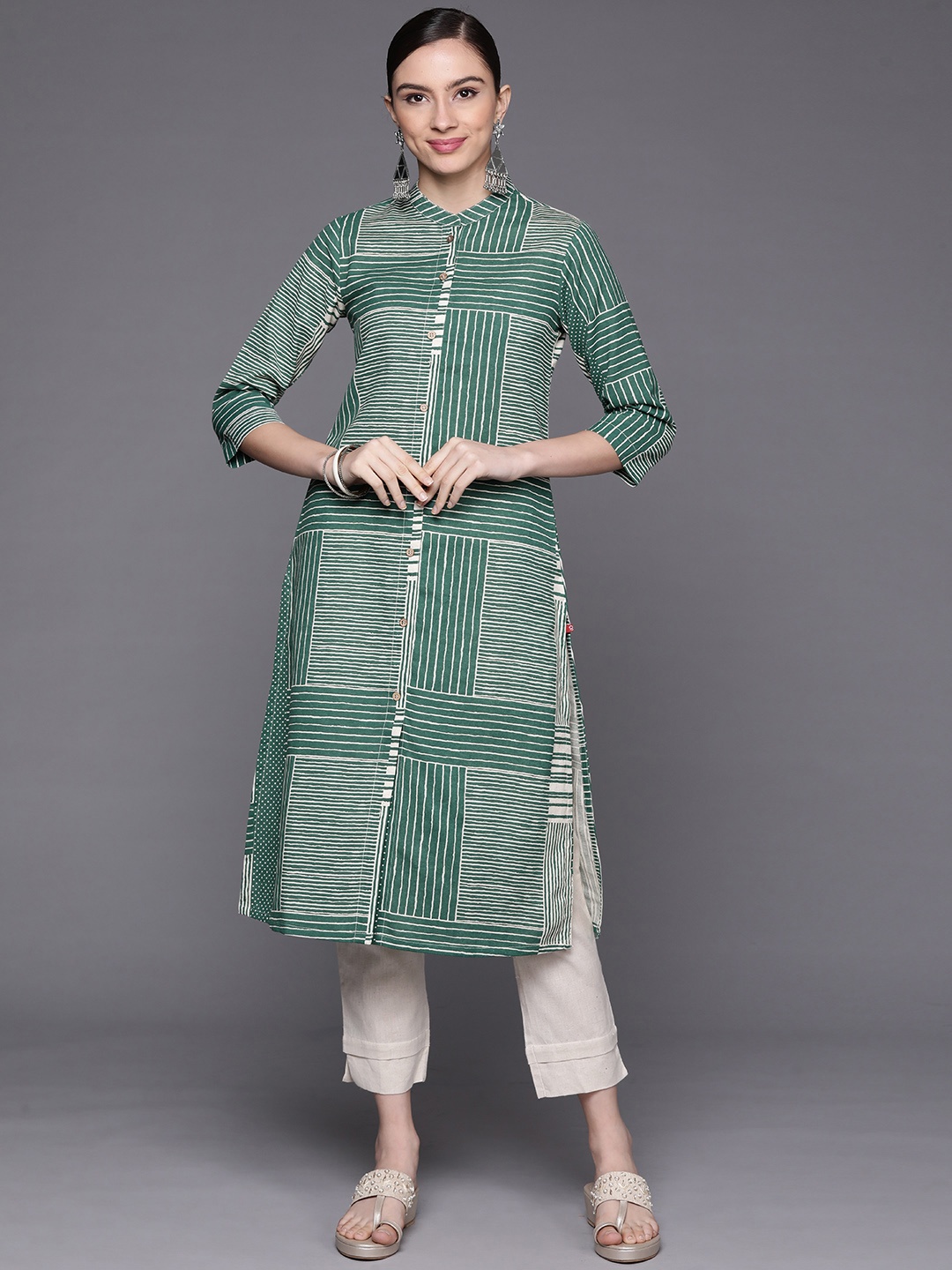 

Biba Women Green Striped Kurta with Trousers