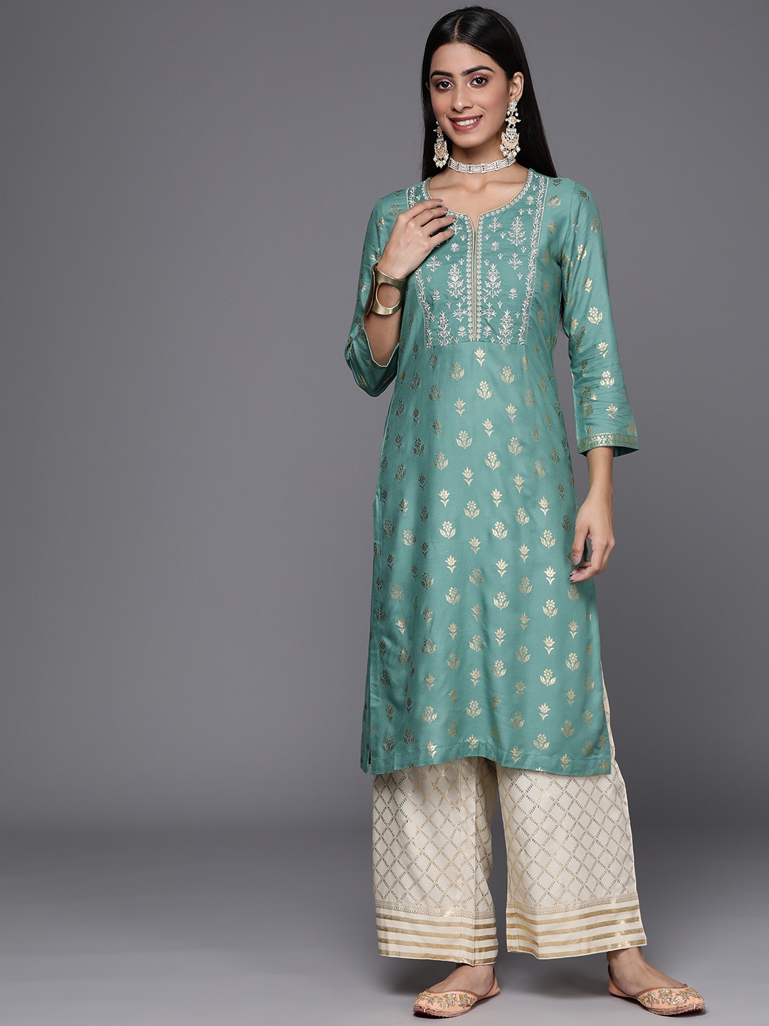 

Biba Women Green & Golden Ethnic Motifs Printed Thread Work Kurta with Palazzos