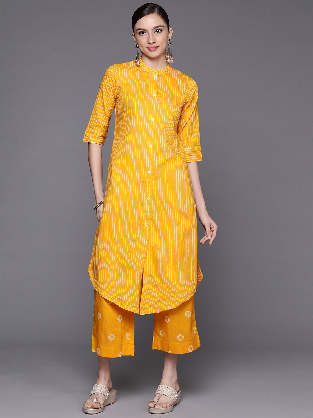 

Biba Women Mustard Yellow Pure Cotton Striped Kurta with Palazzos