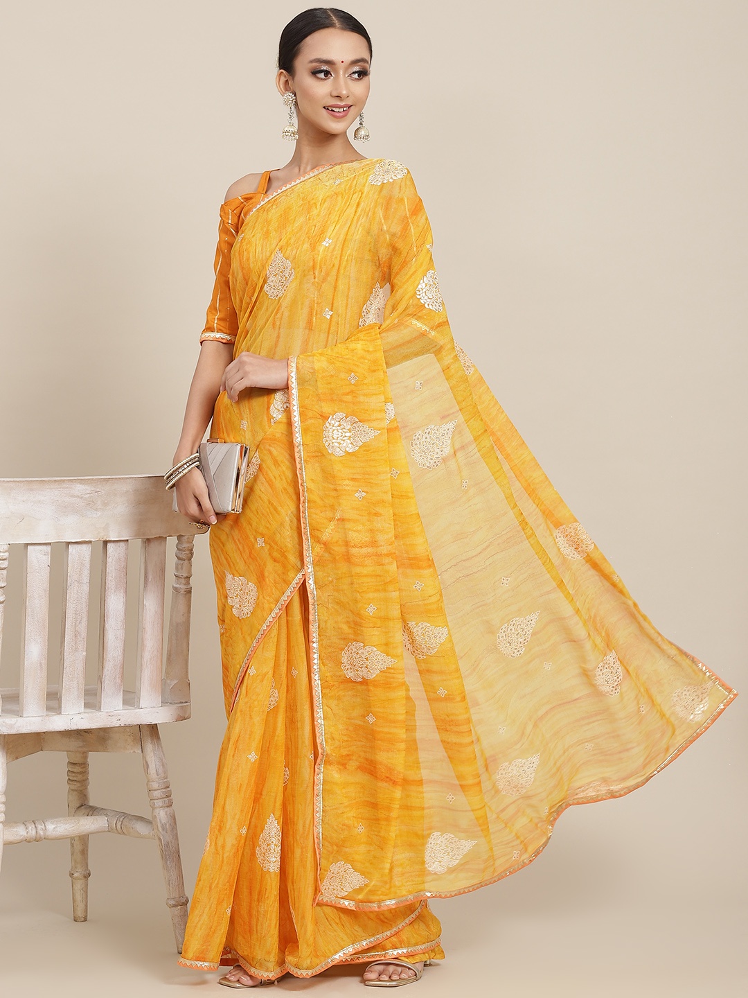 

Satrani Yellow Ethnic Motifs Woven Design Saree