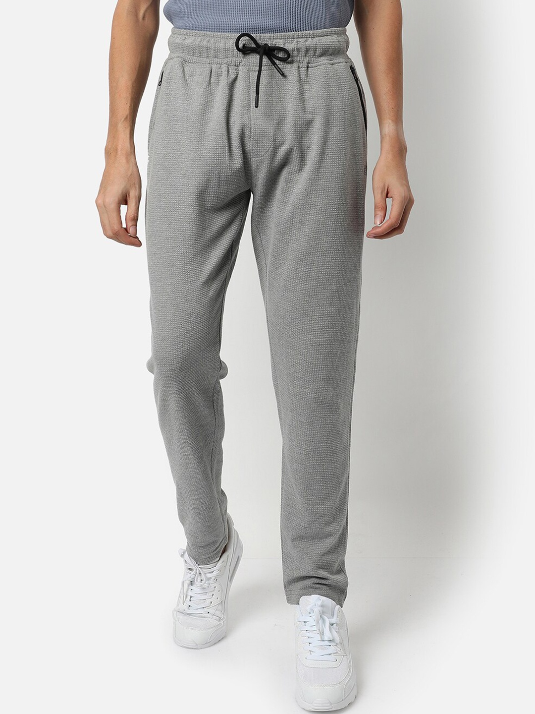 

Campus Sutra Men Grey Regular Fit Solid Track Pants
