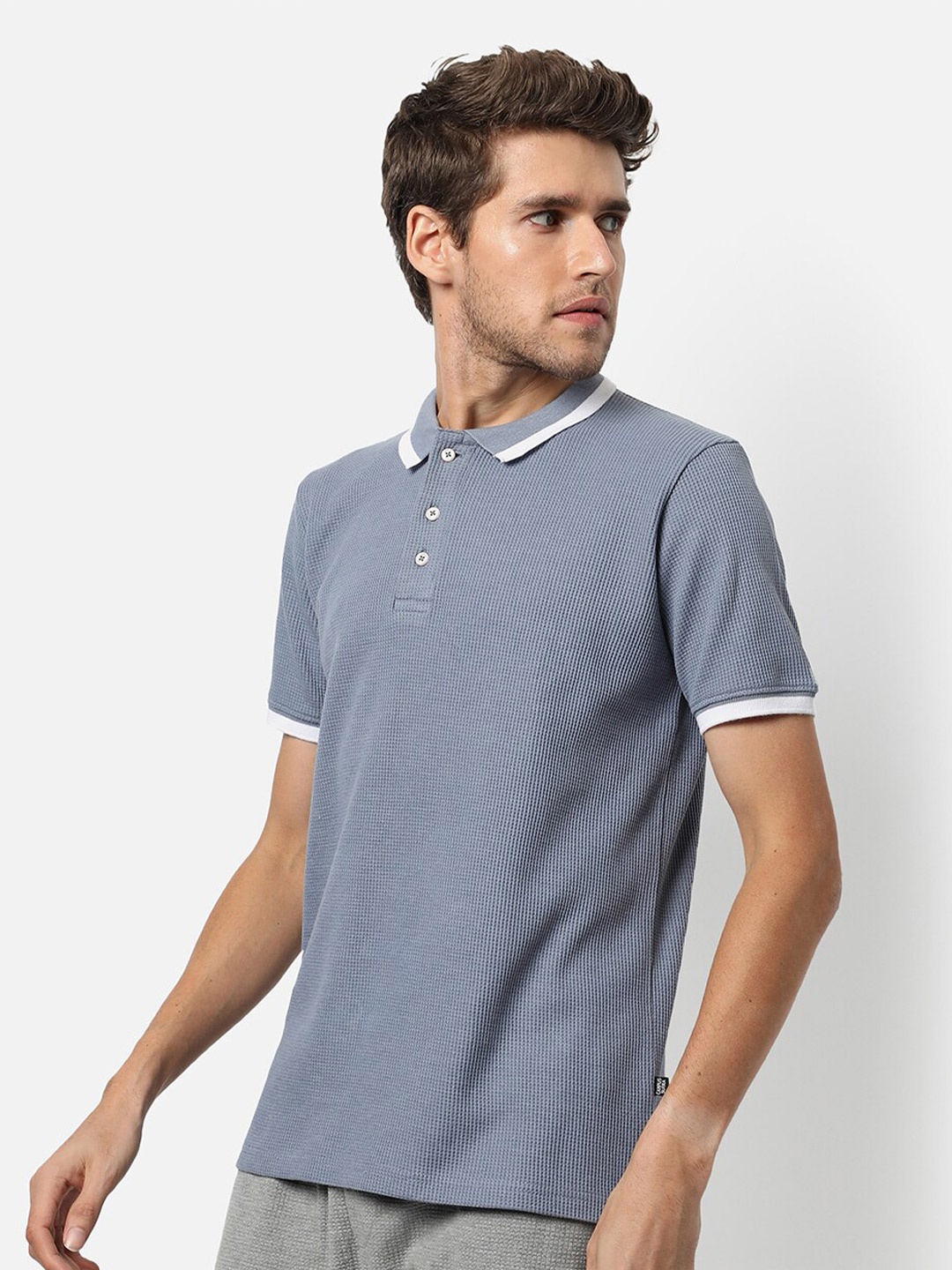 

Campus Sutra Men Blue Polo Collar T-shirt