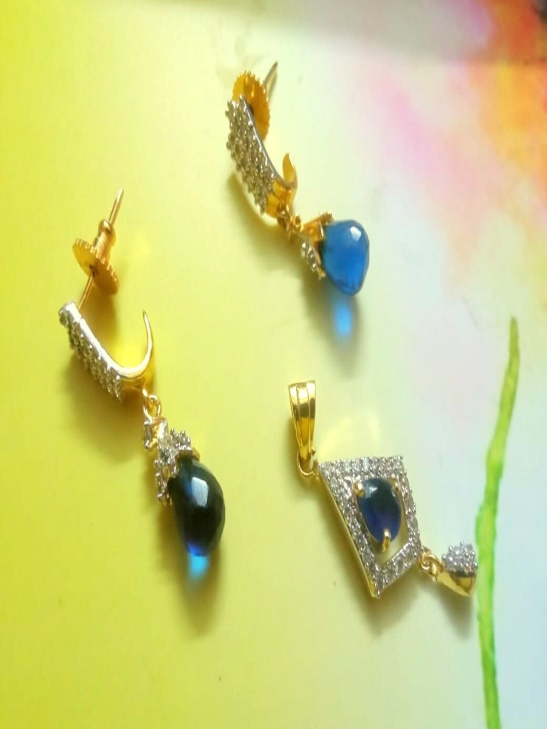 

Runjhun Women Gold-Plated Blue & White CZ-Studded Traditional Jewelry set